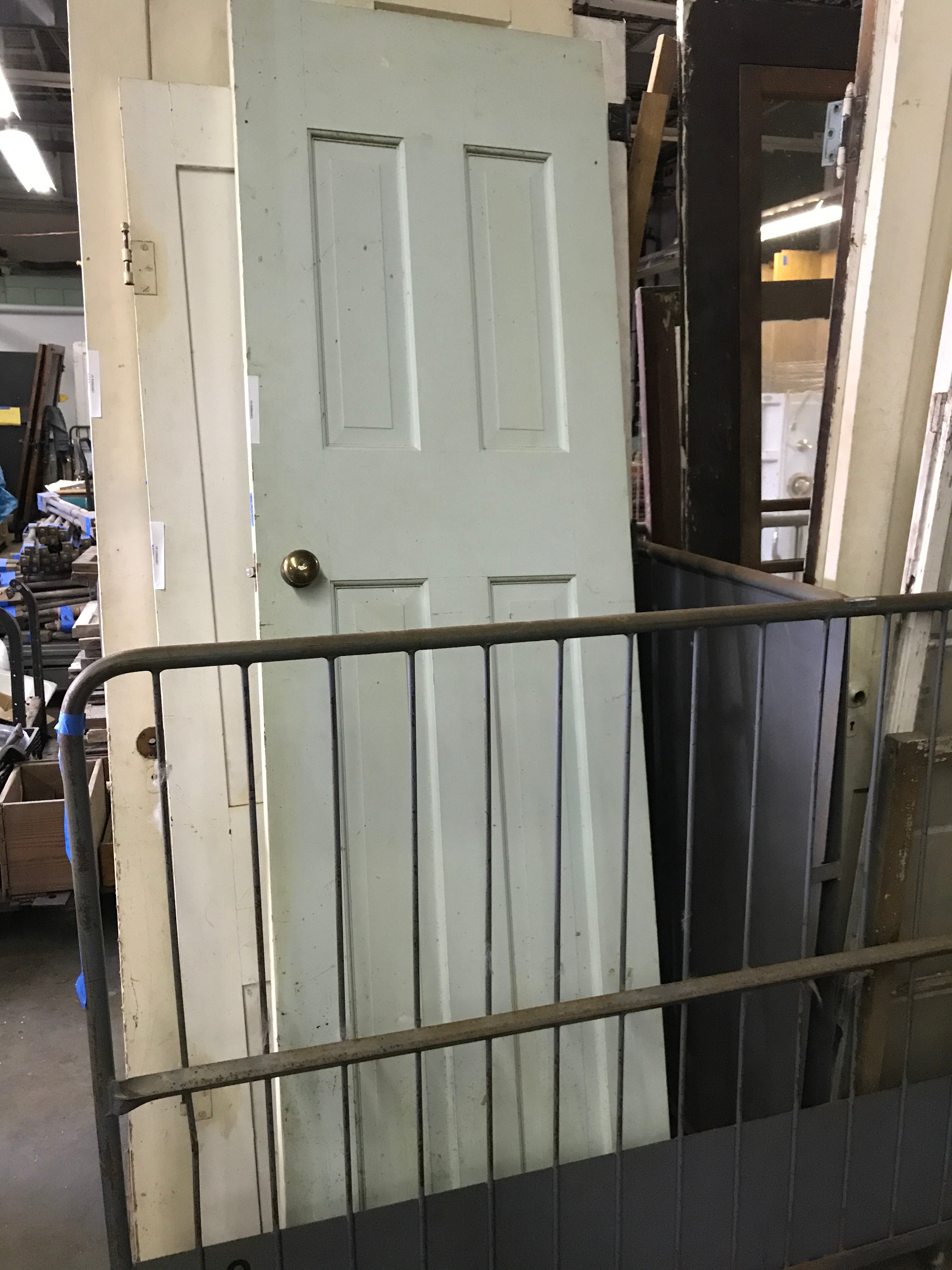 Four Panel Door with Brass Knobs 24"