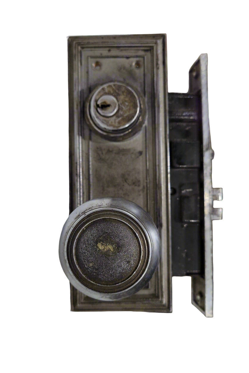 Vintage Mortise Lockset with Nickel-Plated Knobs and Beveled Edge Backplates