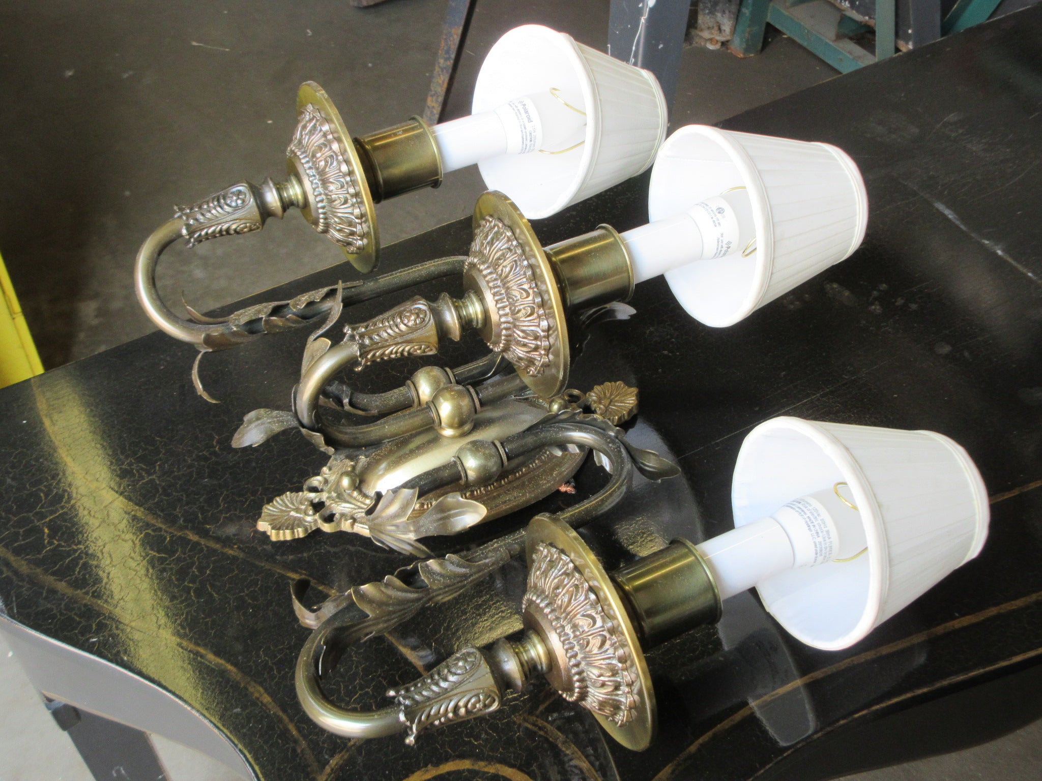 Three Light Wall Sconce with Leaf Embellishment