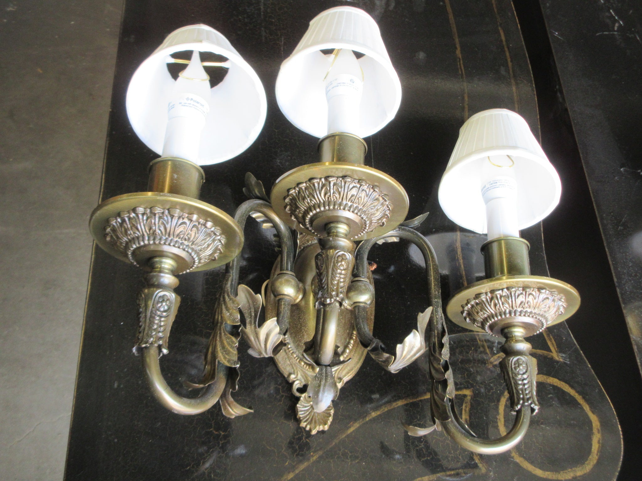 Three Light Wall Sconce with Leaf Embellishment