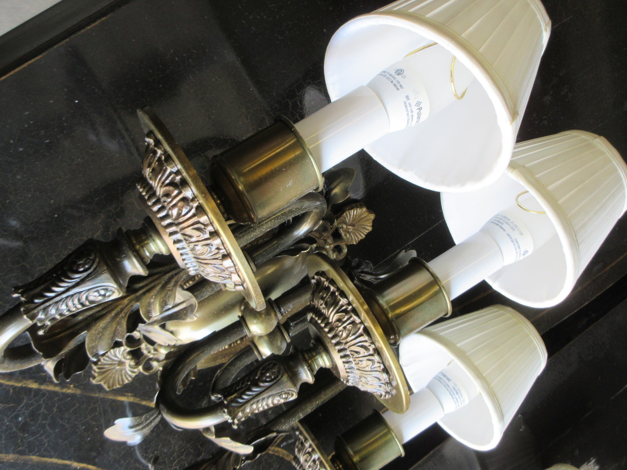 Three Light Wall Sconce with Leaf Embellishment