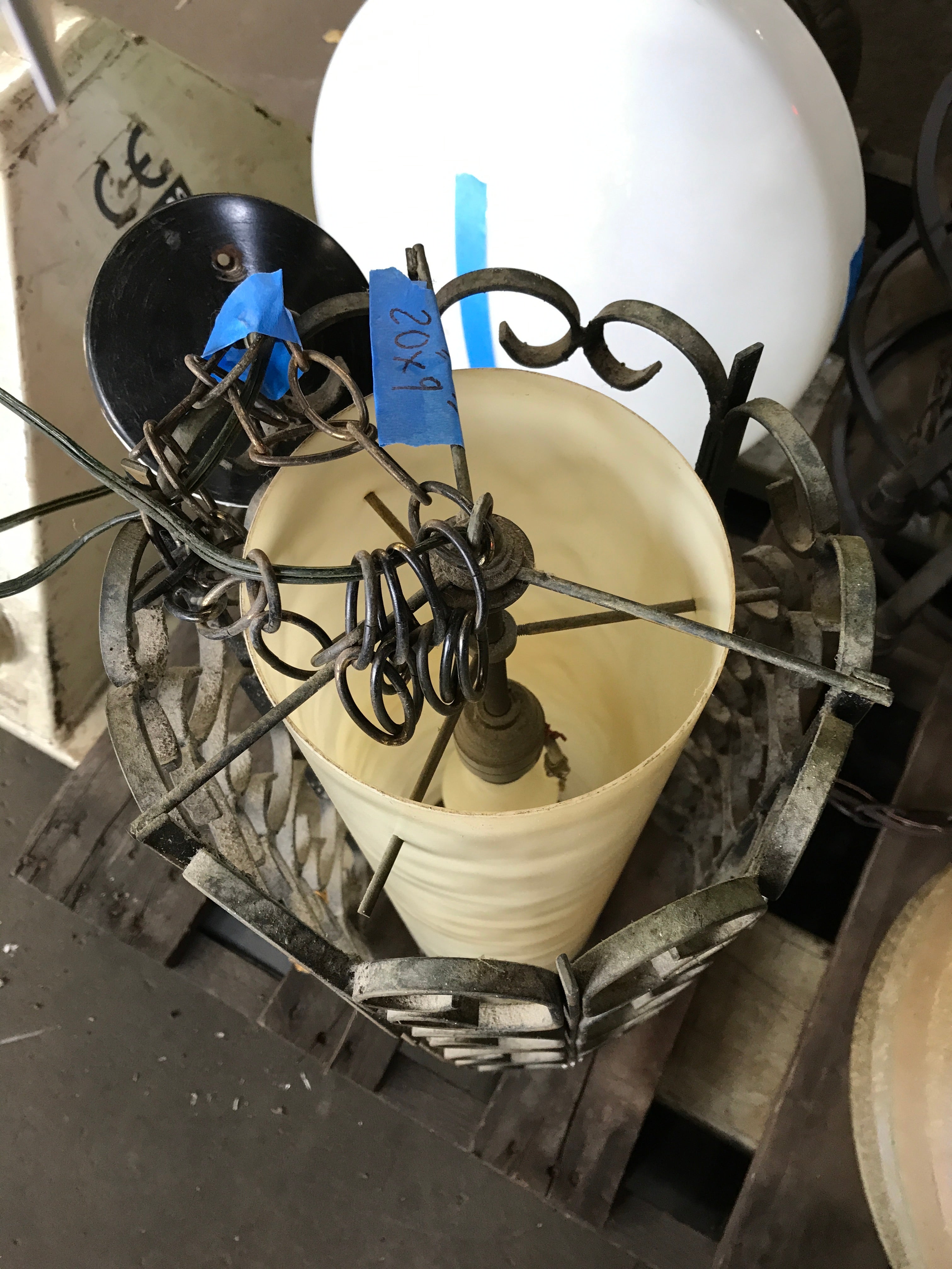 Pendant Light with Plastic Shade and Scroll Style Metal Exterior