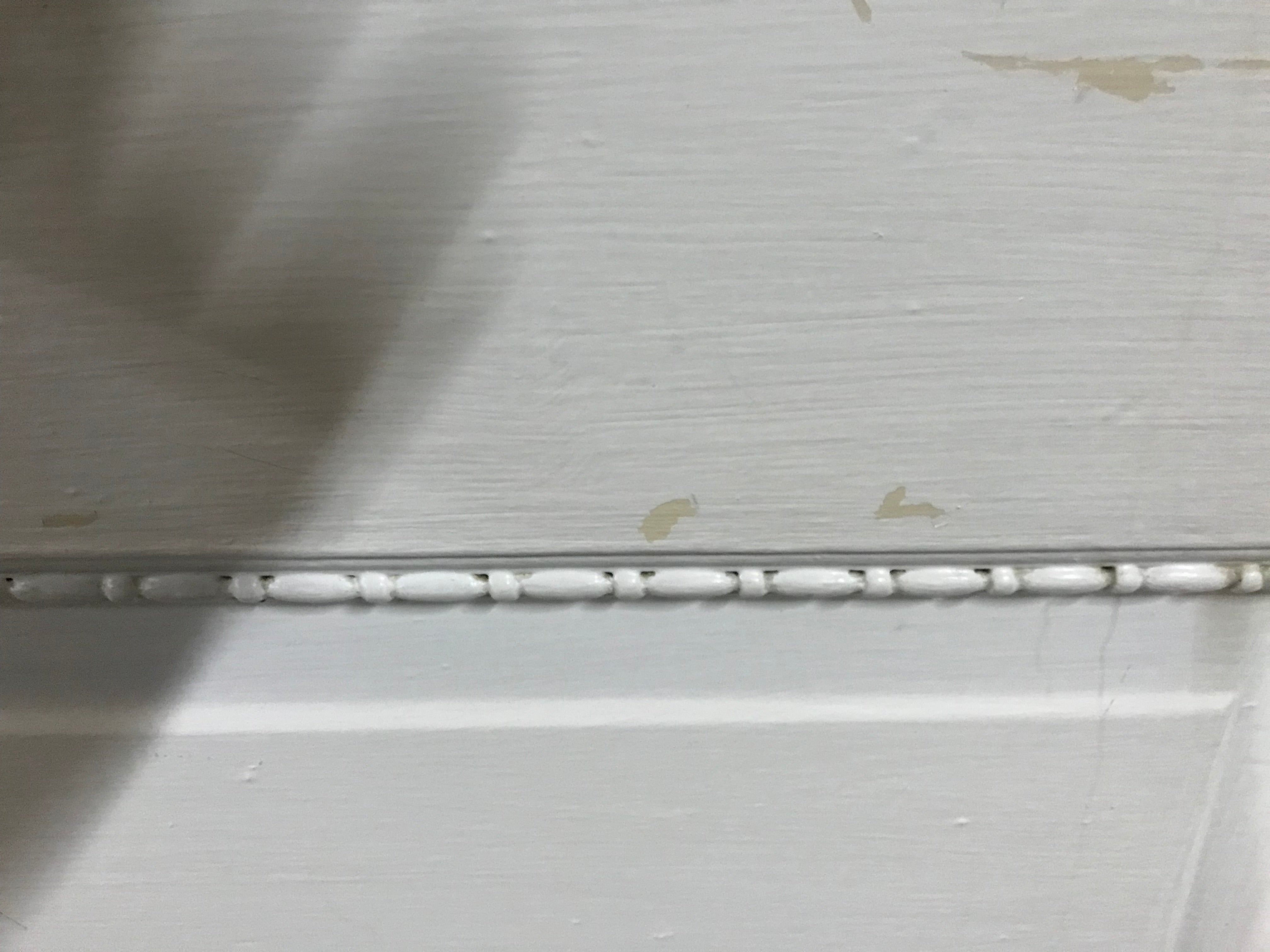 Six Panel Wood Door with decorative trim around panels