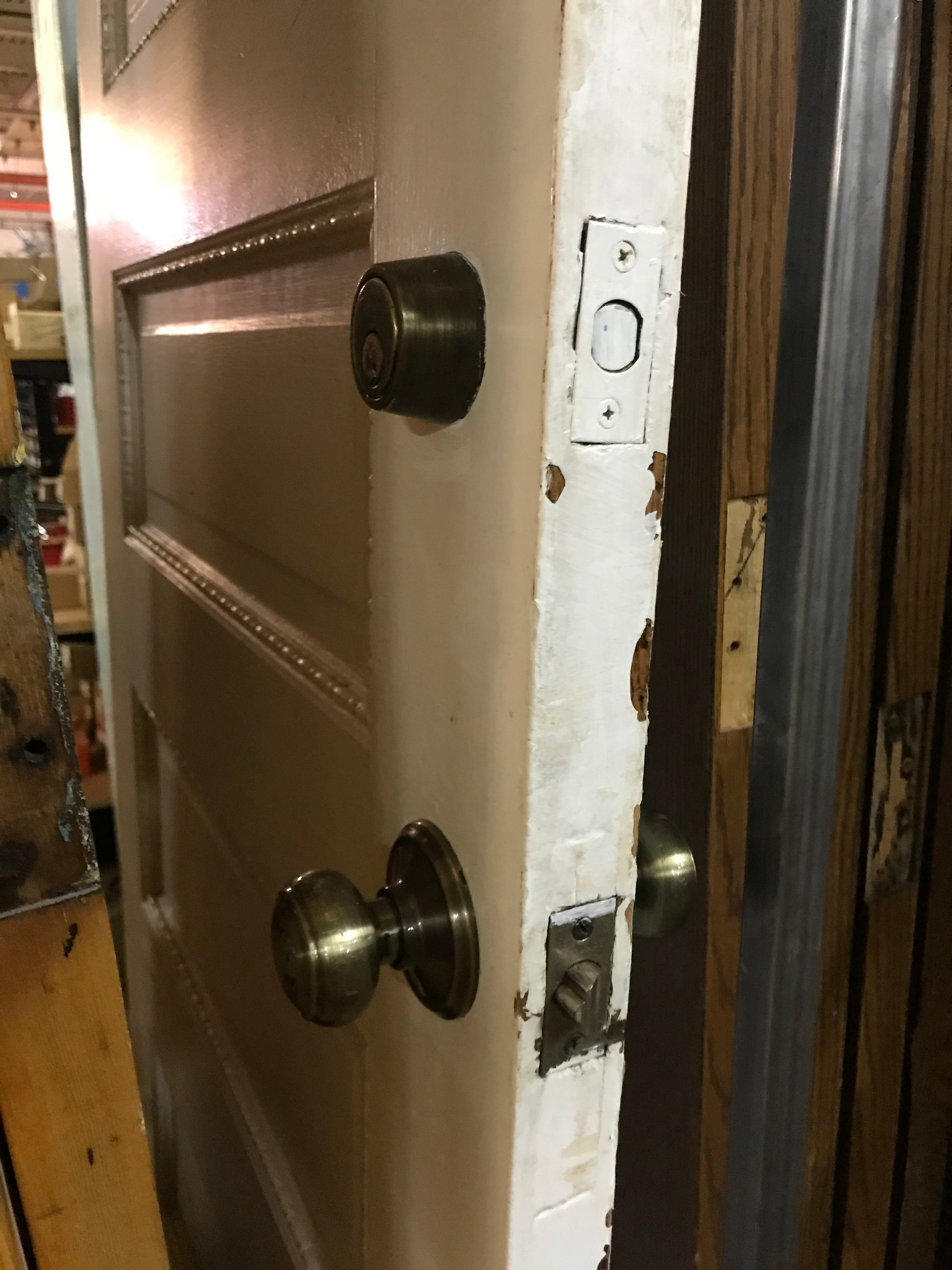 Six Panel Wood Door with decorative trim around panels