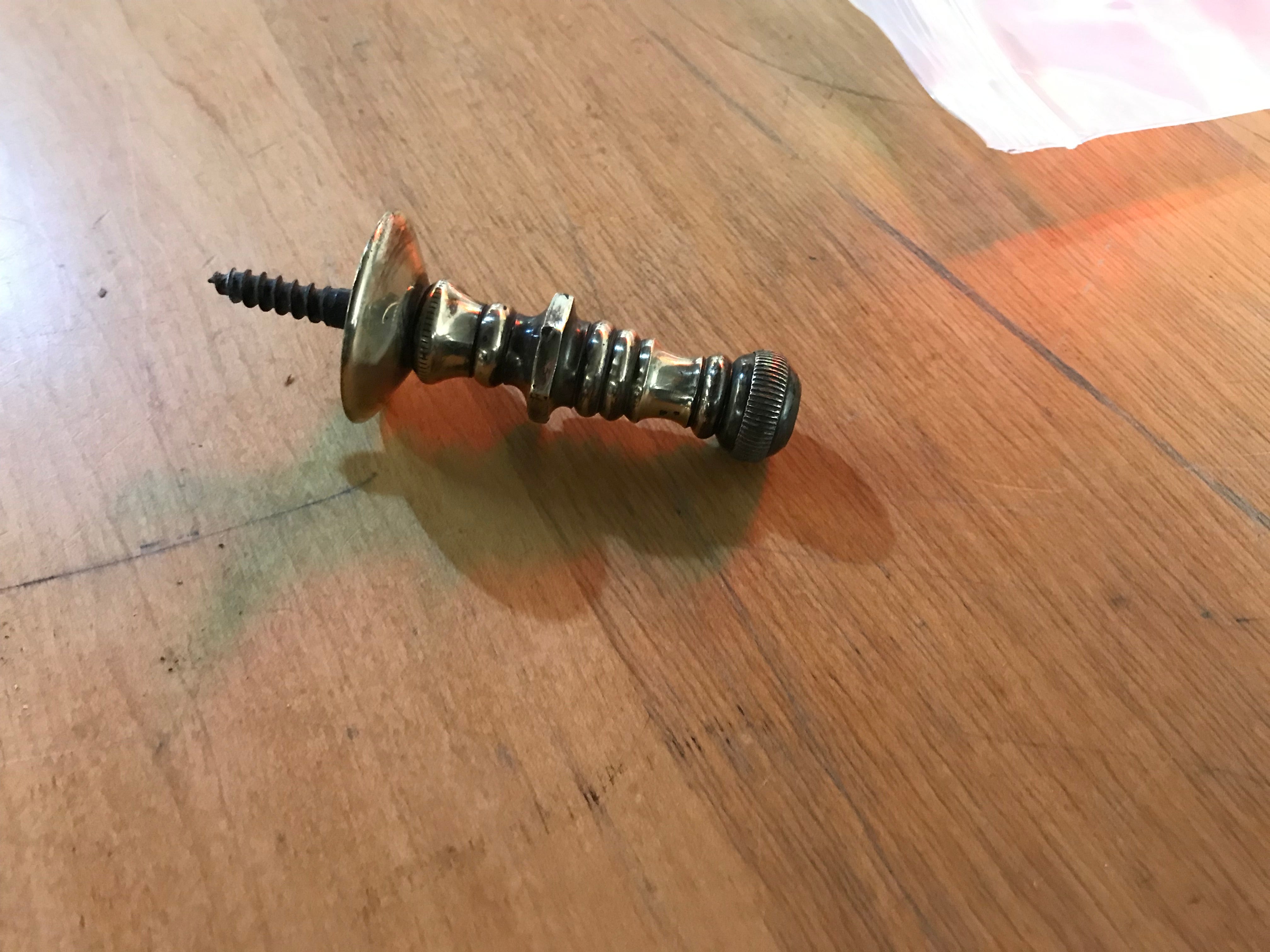Set of Three Brass Decorative Door Stops