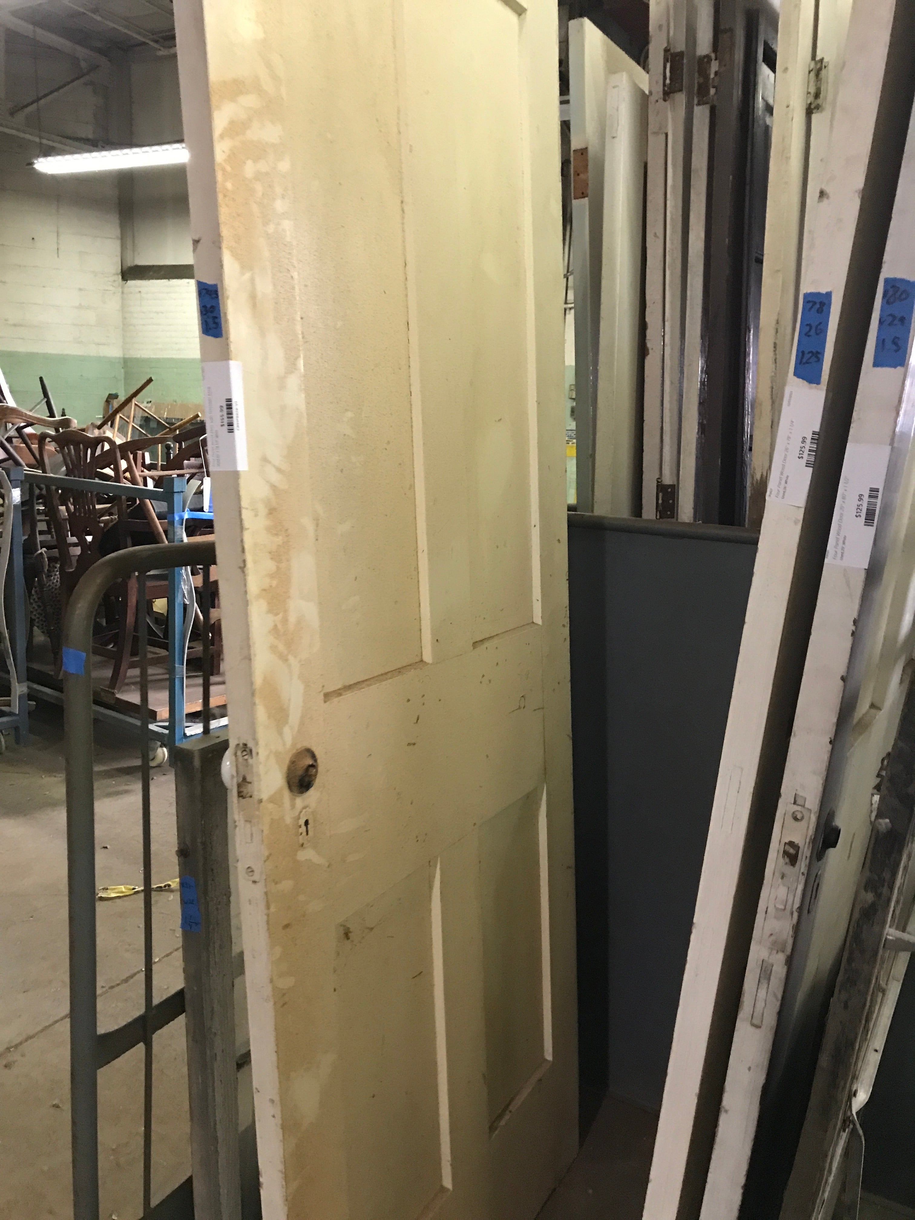 Four Panel Wood Door with Porcelain Knob