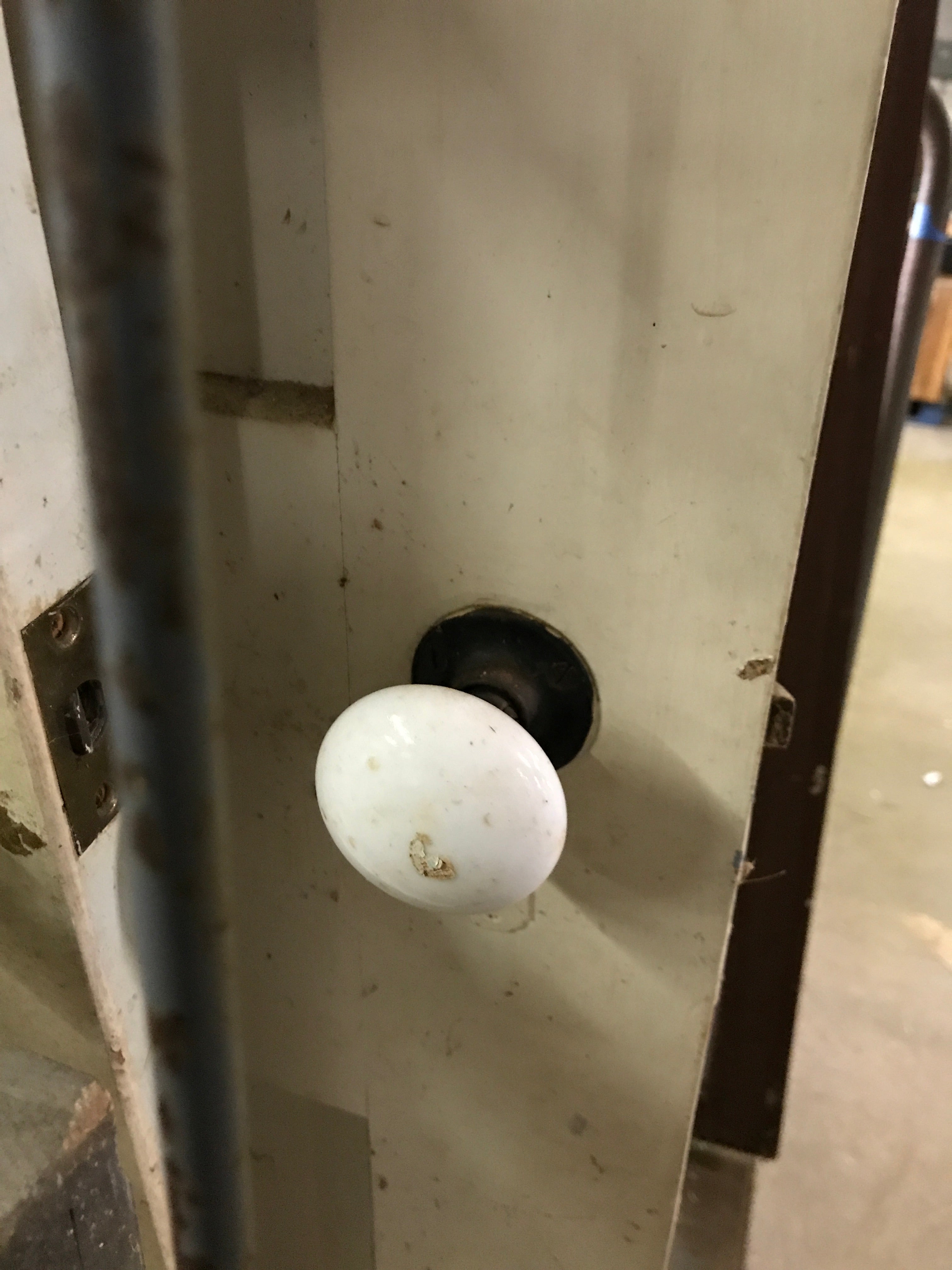 Four Panel Wood Door with Porcelain Knob