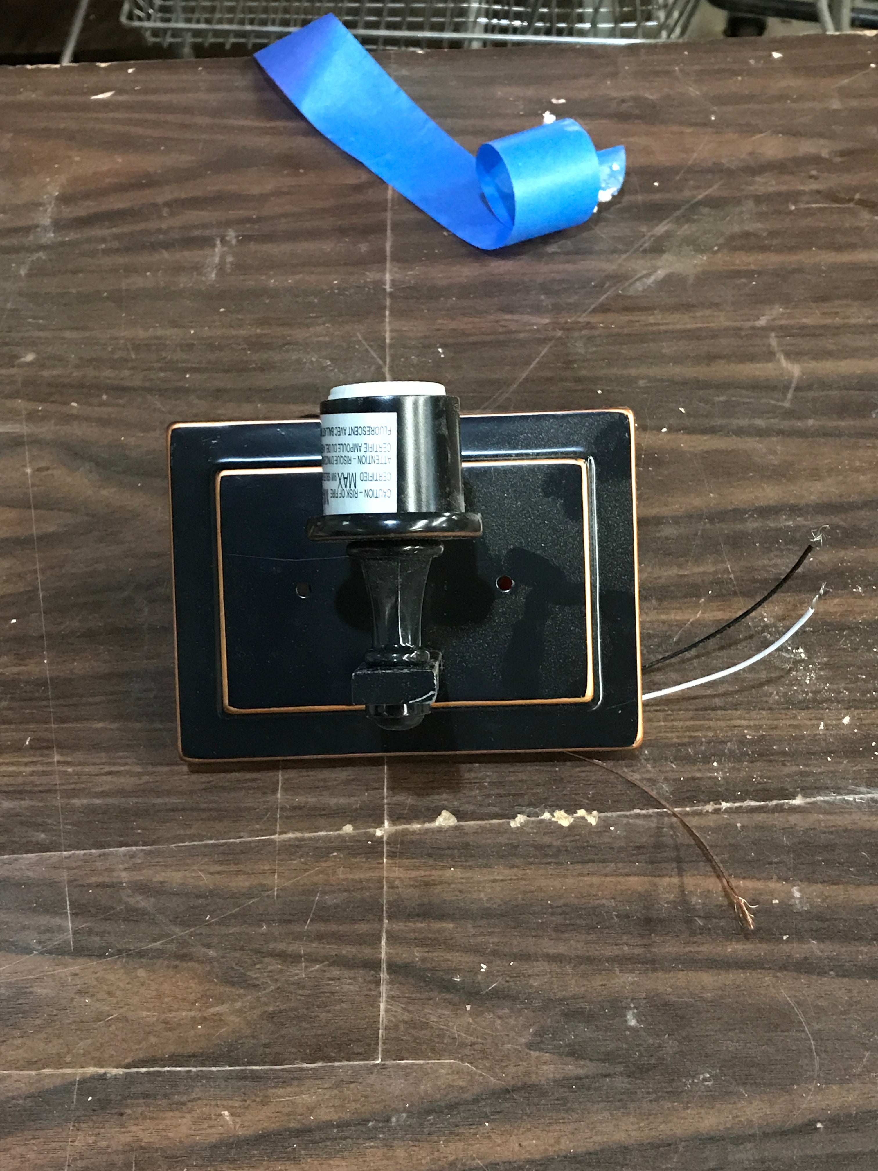 Dark bronze wall sconce