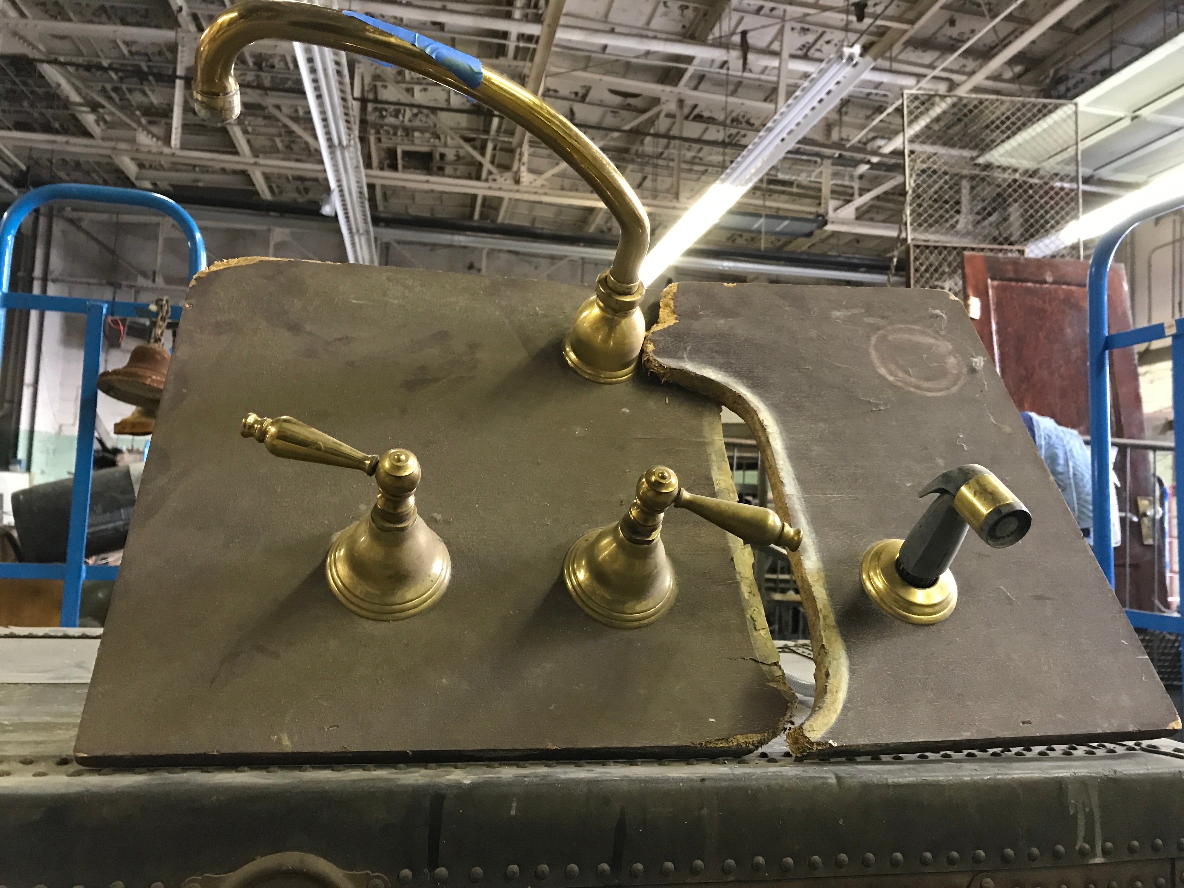 Brass kitchen faucet