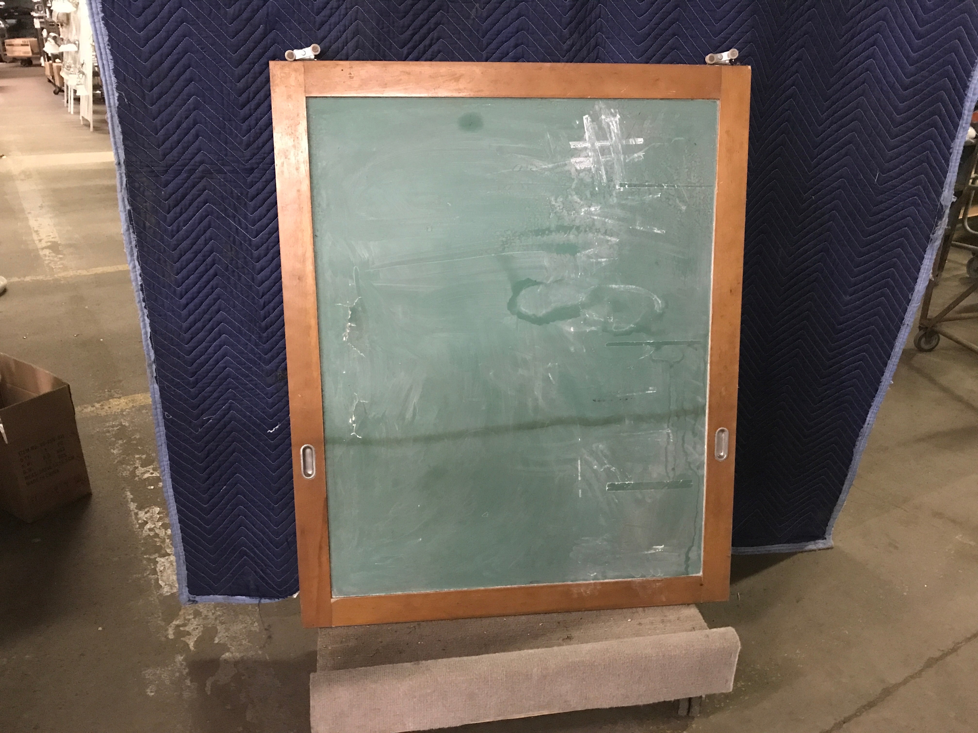 Sliding green chalkboard