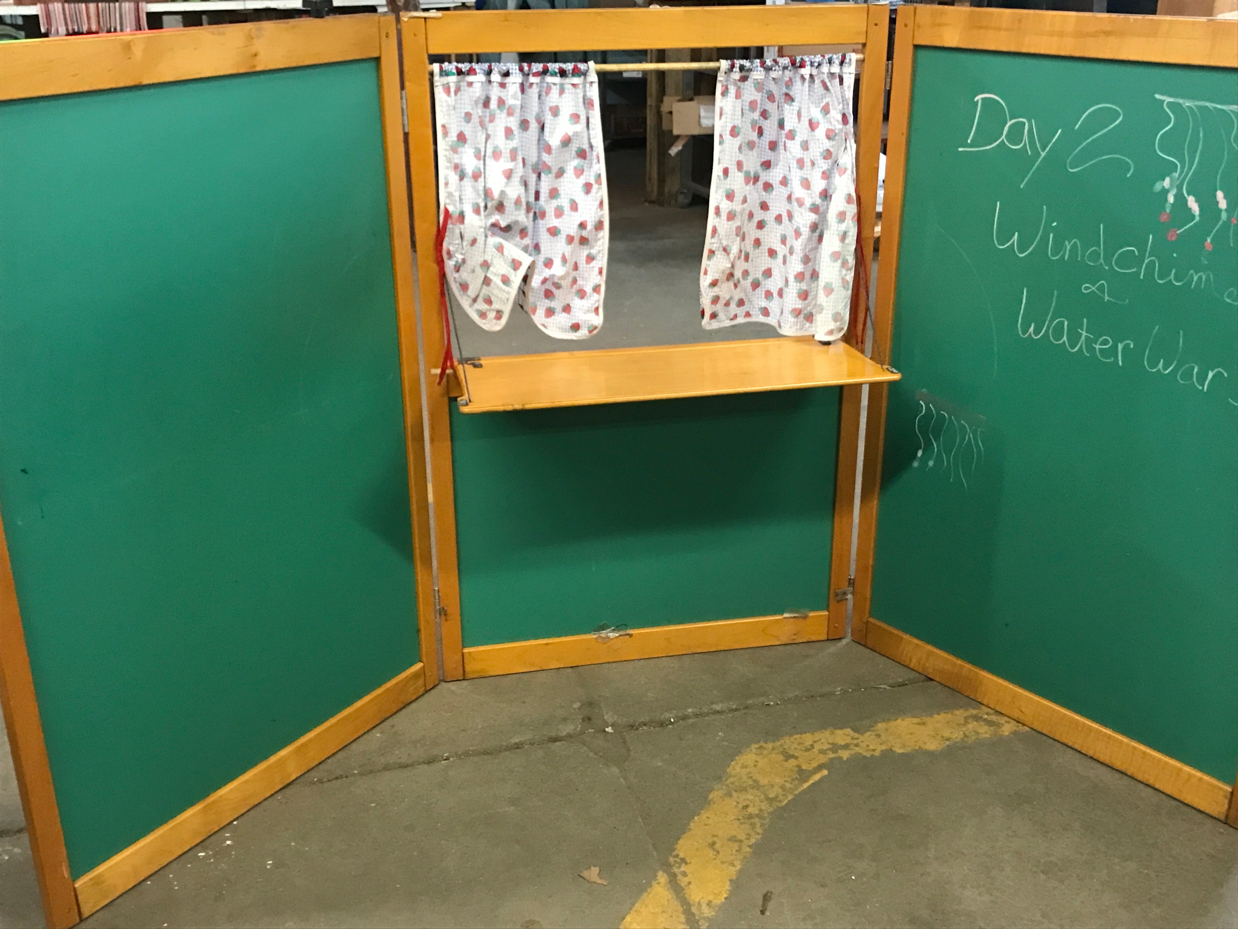 Chalkboard puppet theater