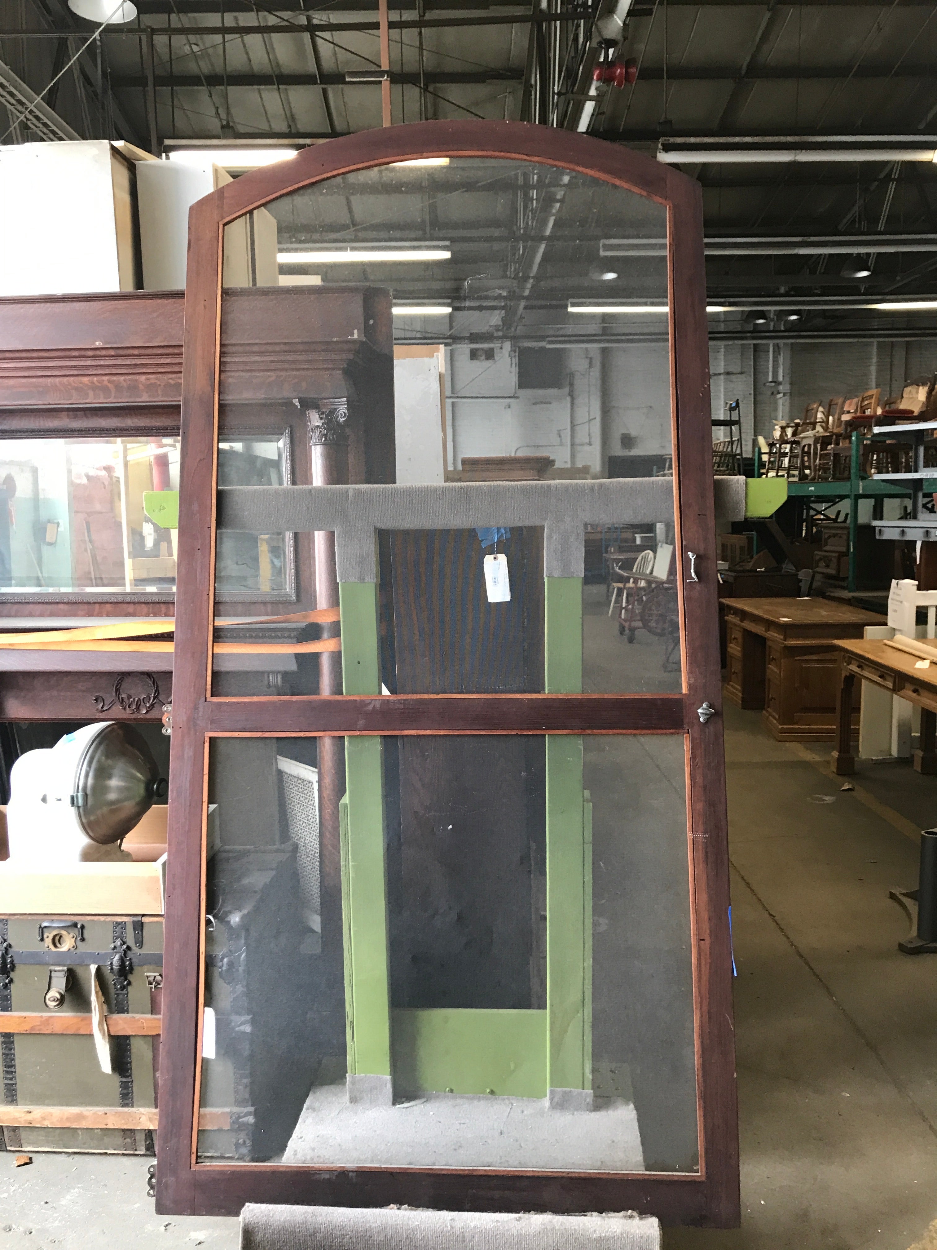 Arched storm door
