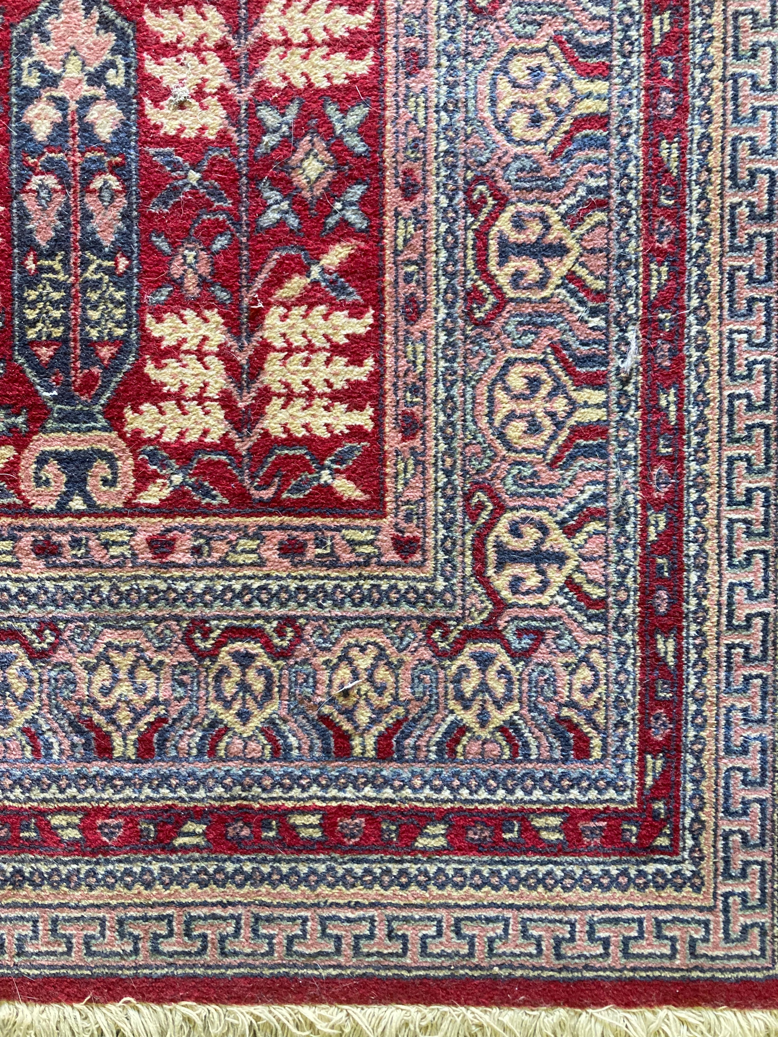 Louis de Poorte Area Rug