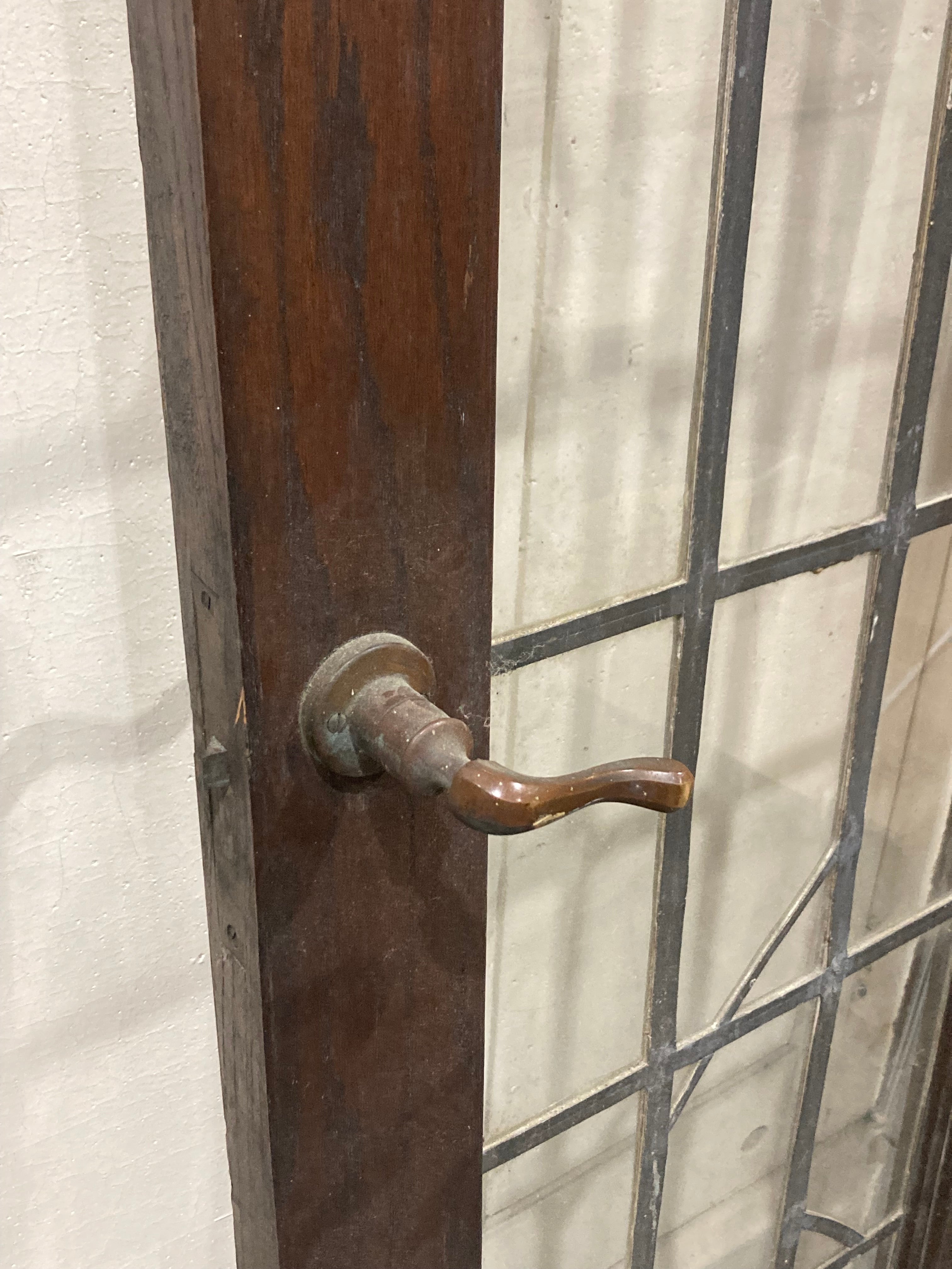 Right in Swing Arched Wooden Door with 24-Lite Leaded Glass Window