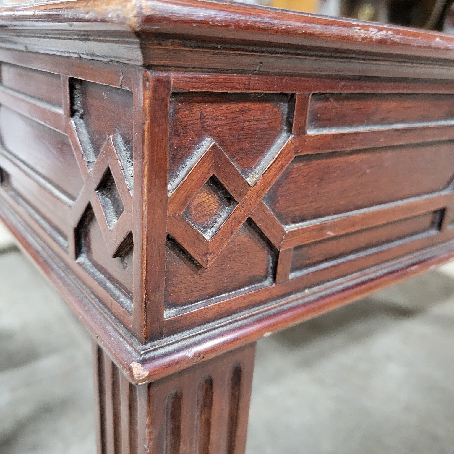 Mahogany-Colored Coffee Table with Geometric Detailing