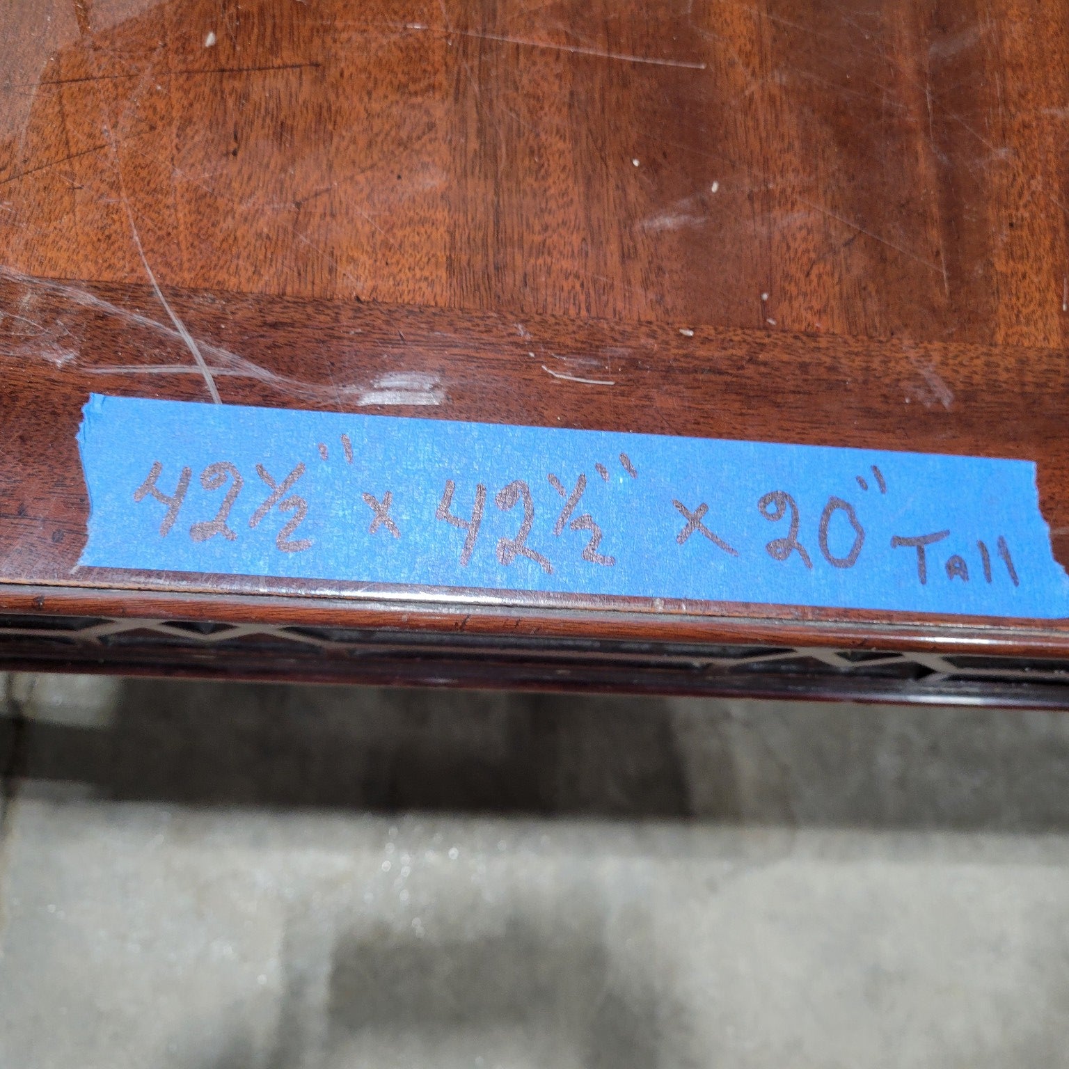 Mahogany-Colored Coffee Table with Geometric Detailing