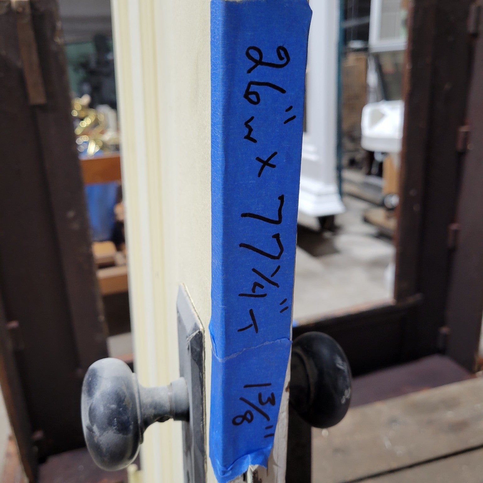 Two-Panel Wooden Door with Black Hardware