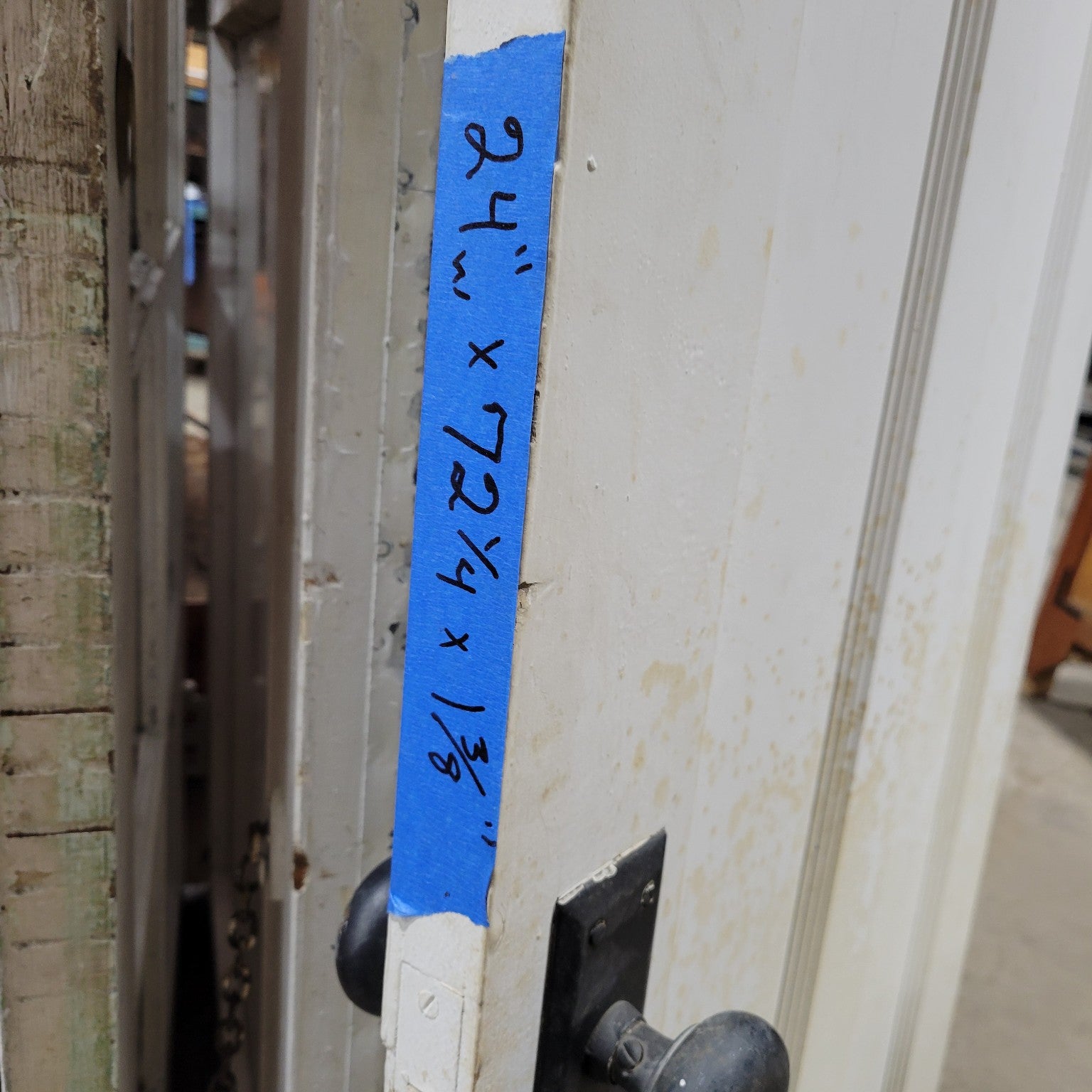 Two-Panel Wooden Door with Black Hardware