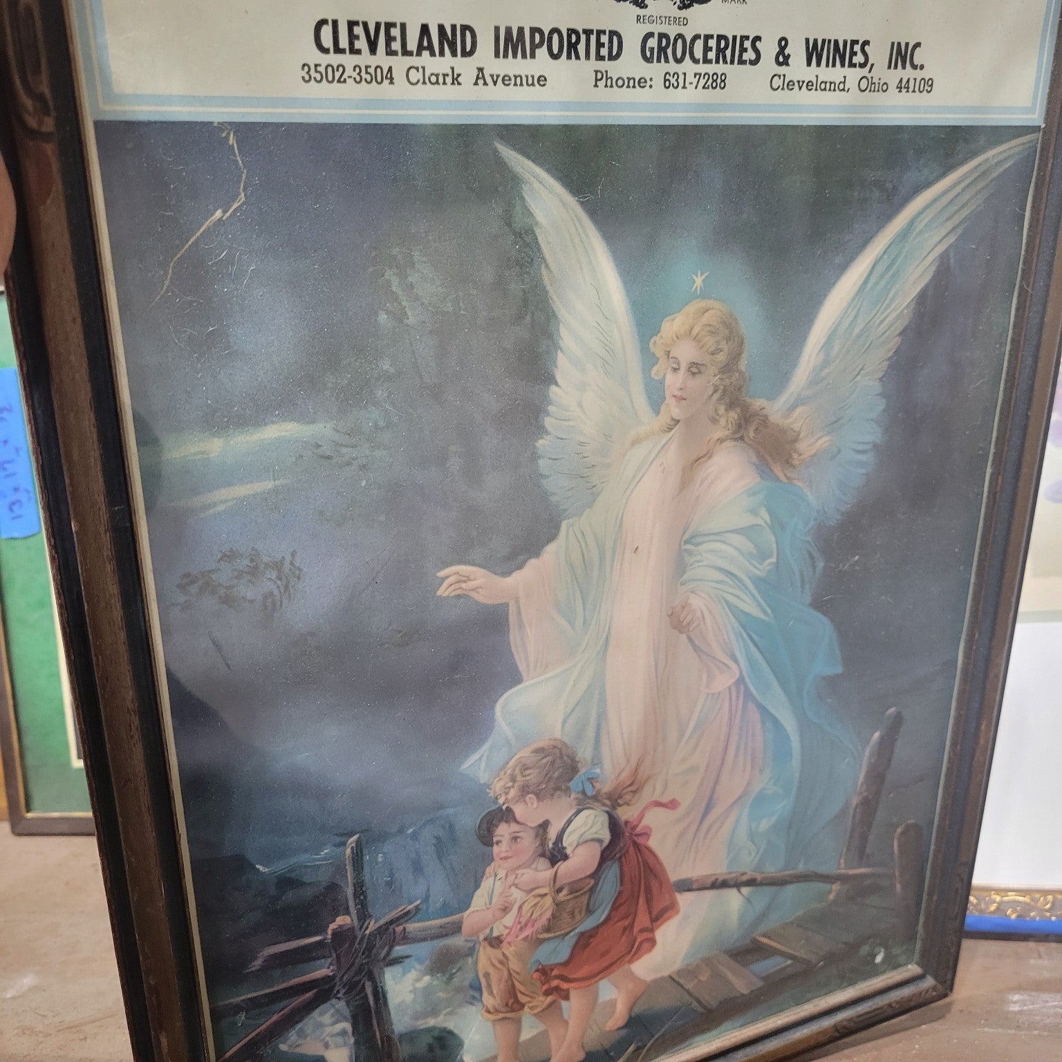 Guardian Angel Print with Cleveland Imported Groceries & Wines, Inc. Advertisement