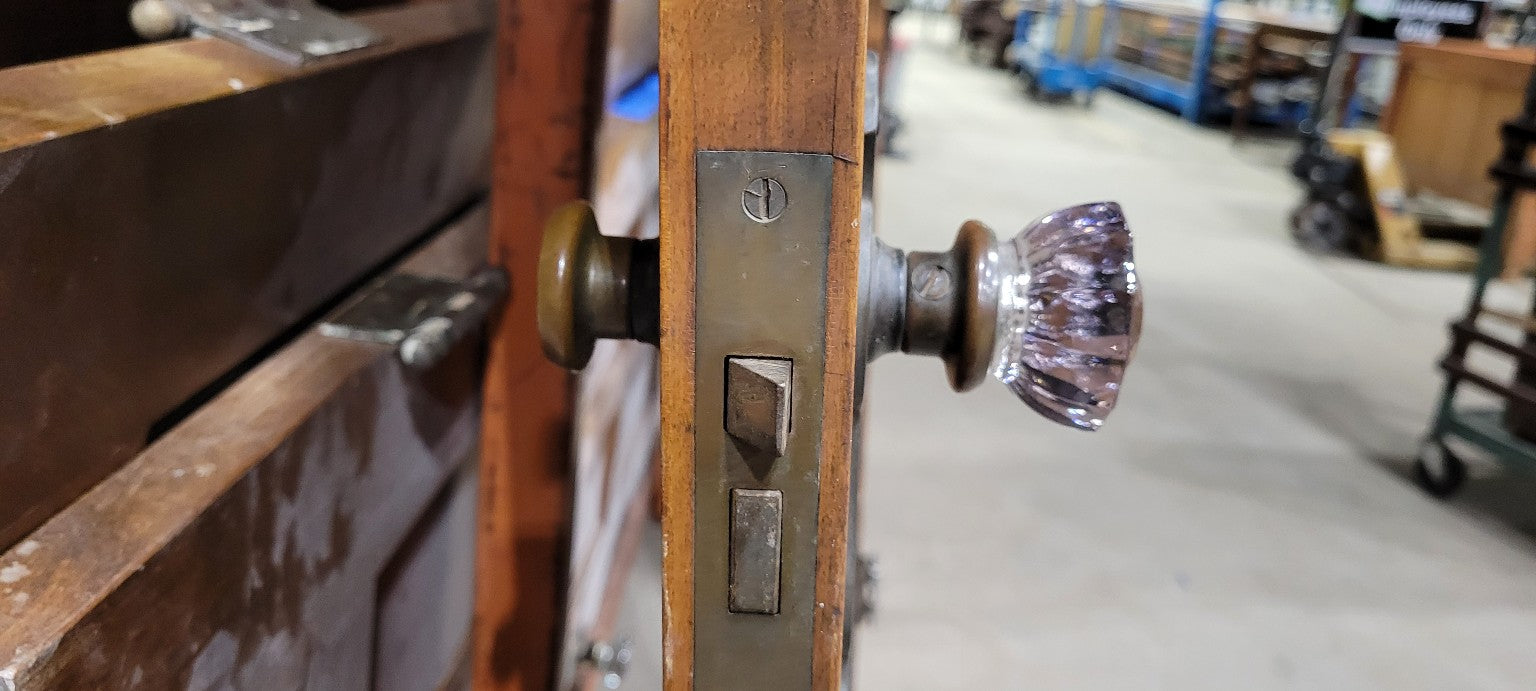 Vintage Wooden Eight-Panel Door with Glass Knob
