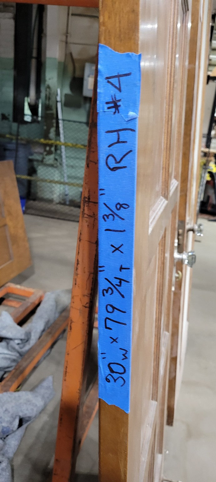 Vintage Wooden Eight-Panel Door with Glass Knob