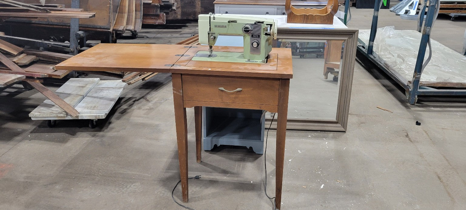 Vintage White Sewing Machine in Wooden Cabinet
