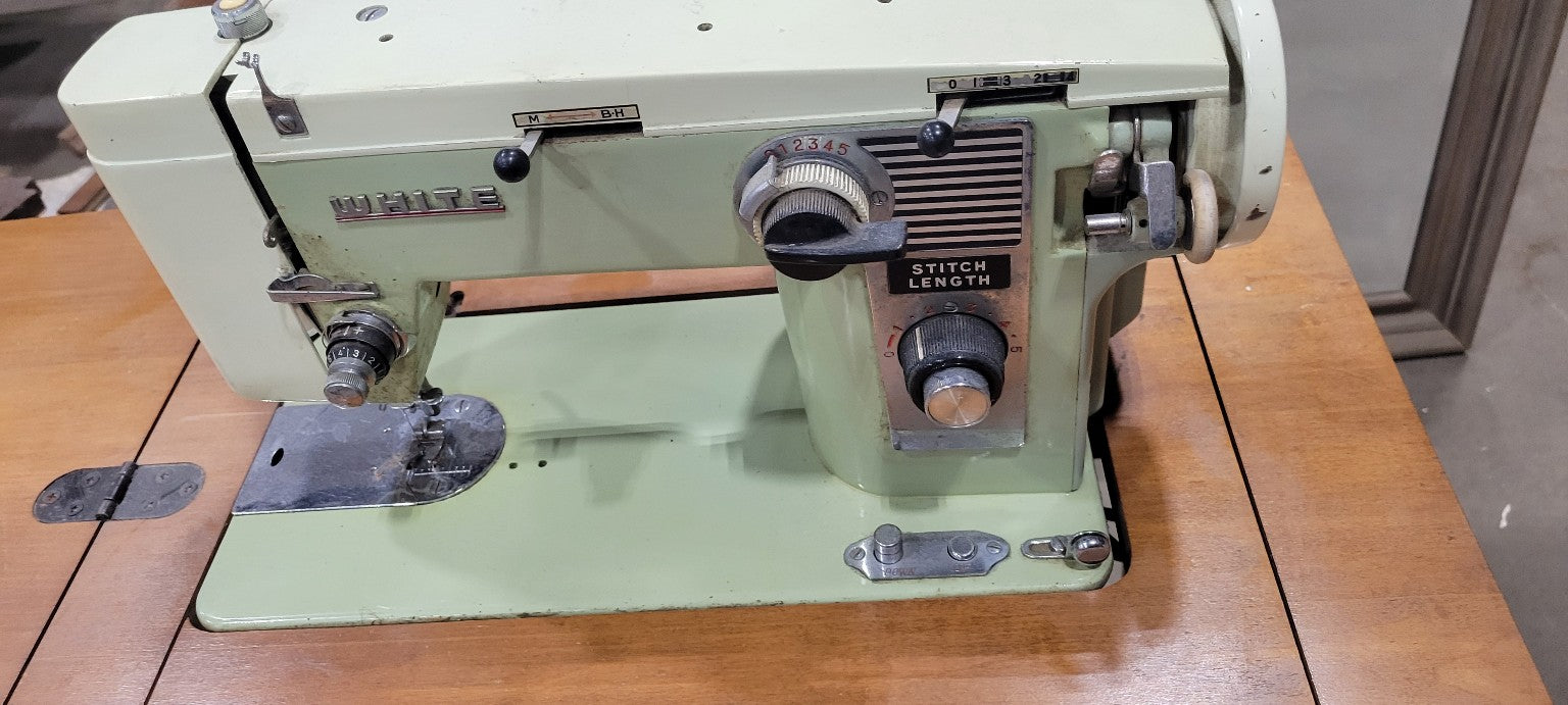 Vintage White Sewing Machine in Wooden Cabinet