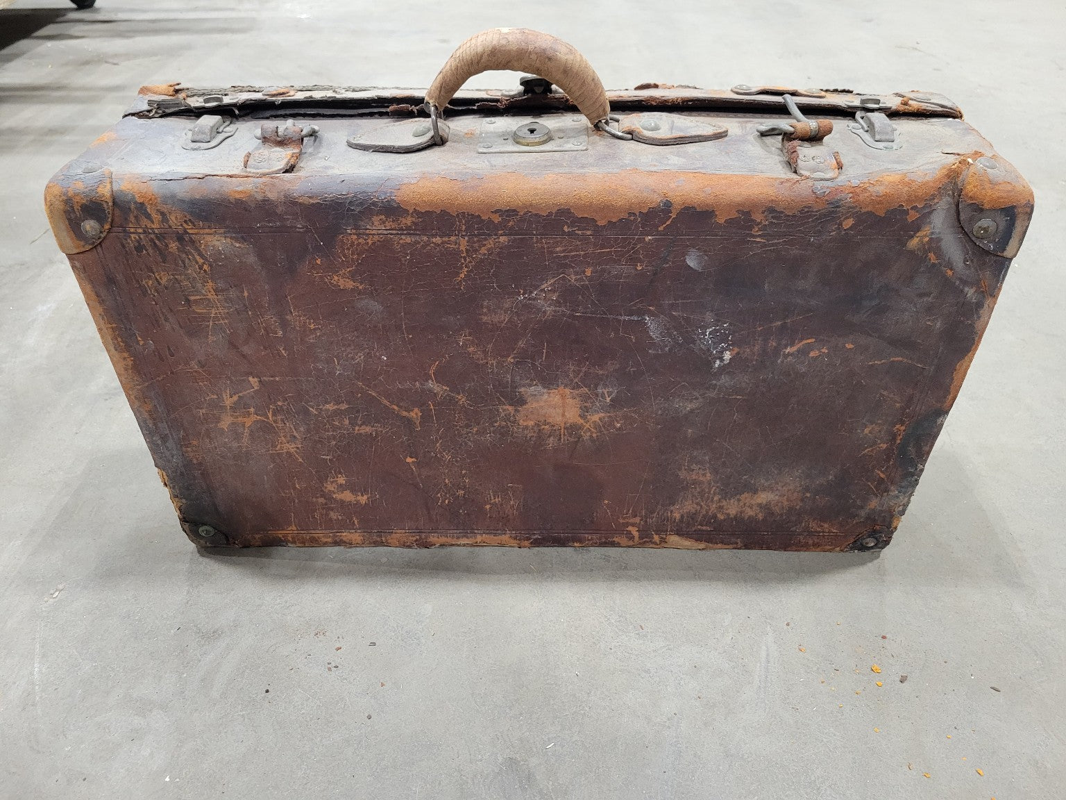 Vintage Distressed Leather Suitcase
