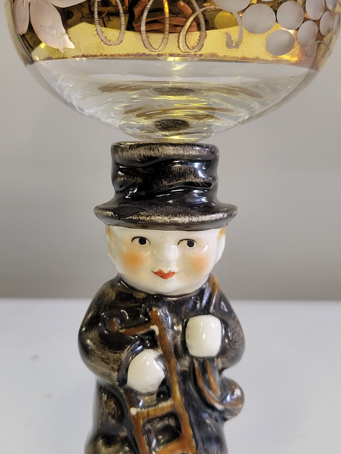 Goebel Hummel Figural Stemmed Glass with Gold Leaf Motif