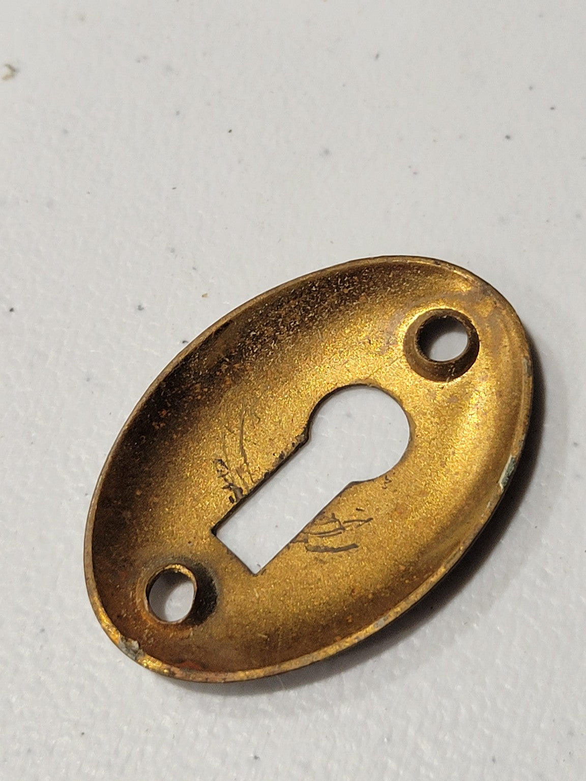 Oval Brass Keyhole Escutcheon