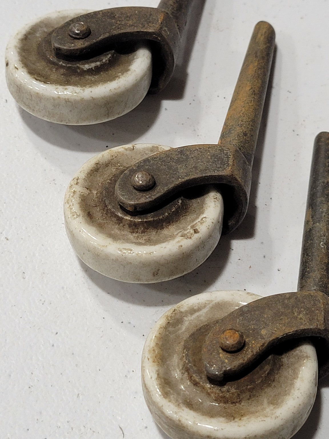 Set of 3 Antique Porcelain and Iron Furniture Casters