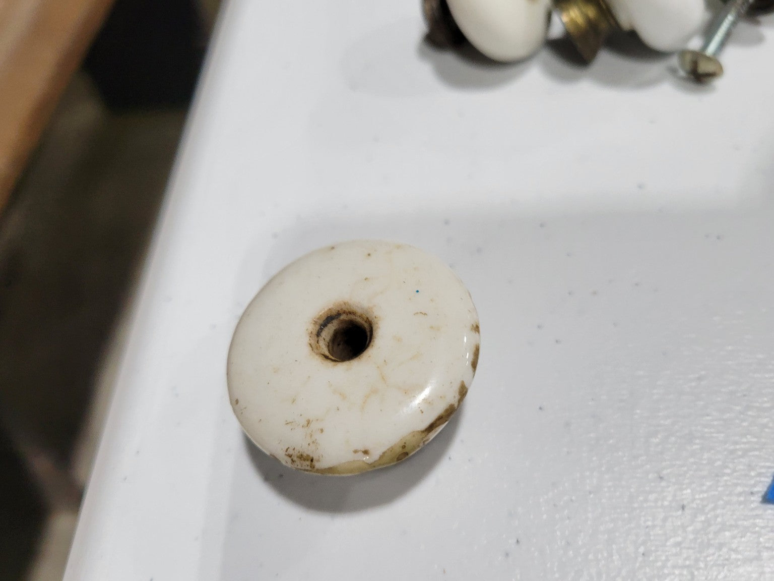 Single Aged White Porcelain Cabinet Knob – 1 ½" Diameter