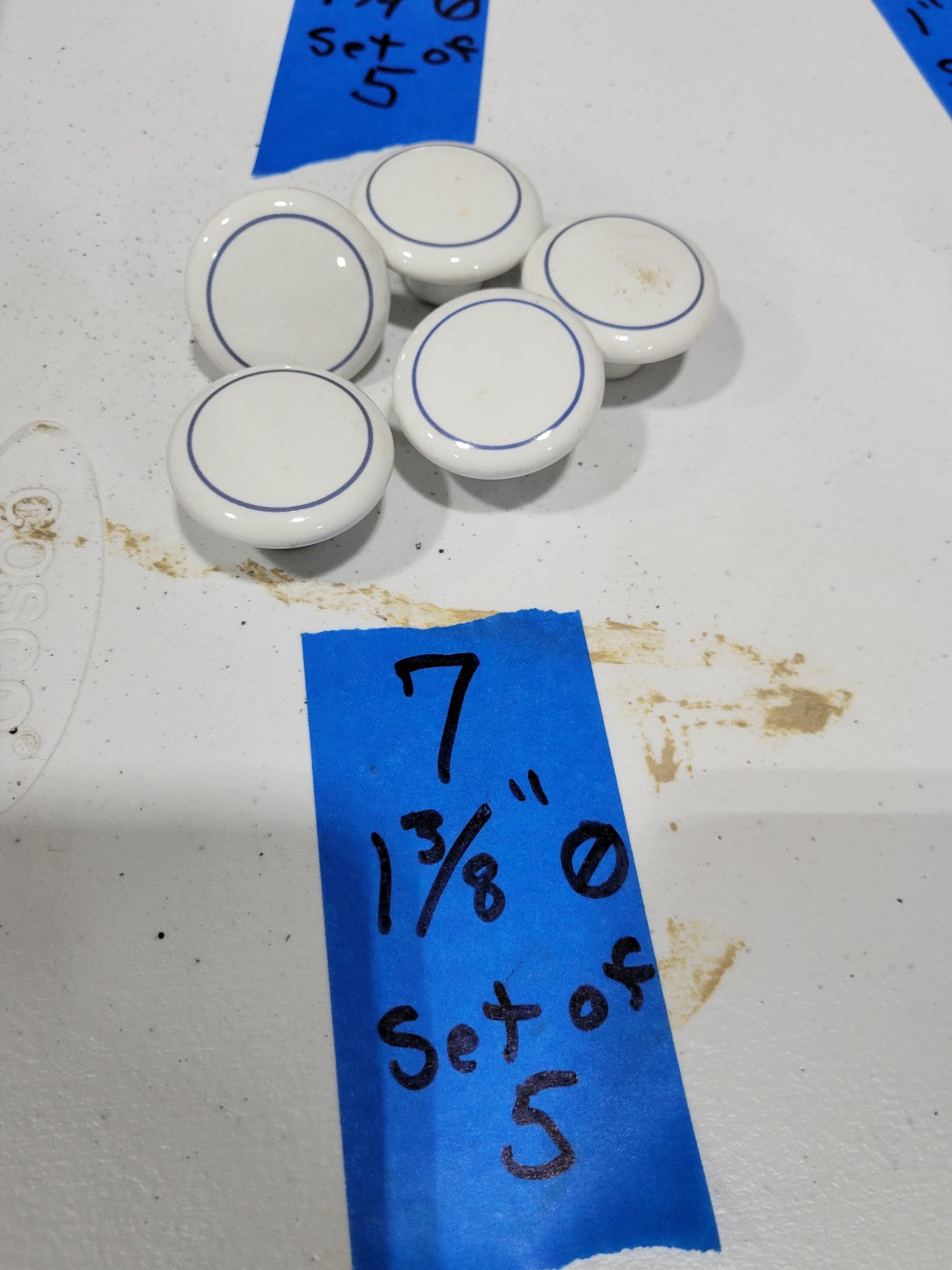 White Porcelain Drawer Pulls with Blue Ring Detail – Set of 5 (1 3/8")*