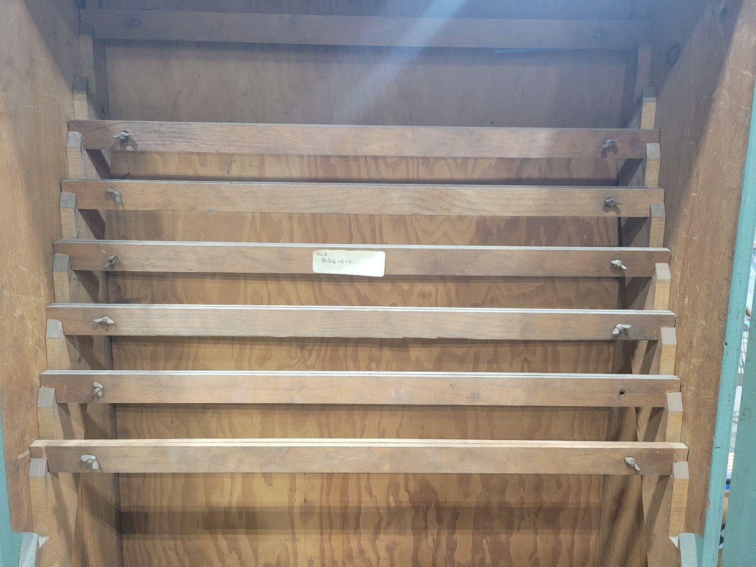 Tall Green Industrial Cabinet with Adjustable Wood Slats