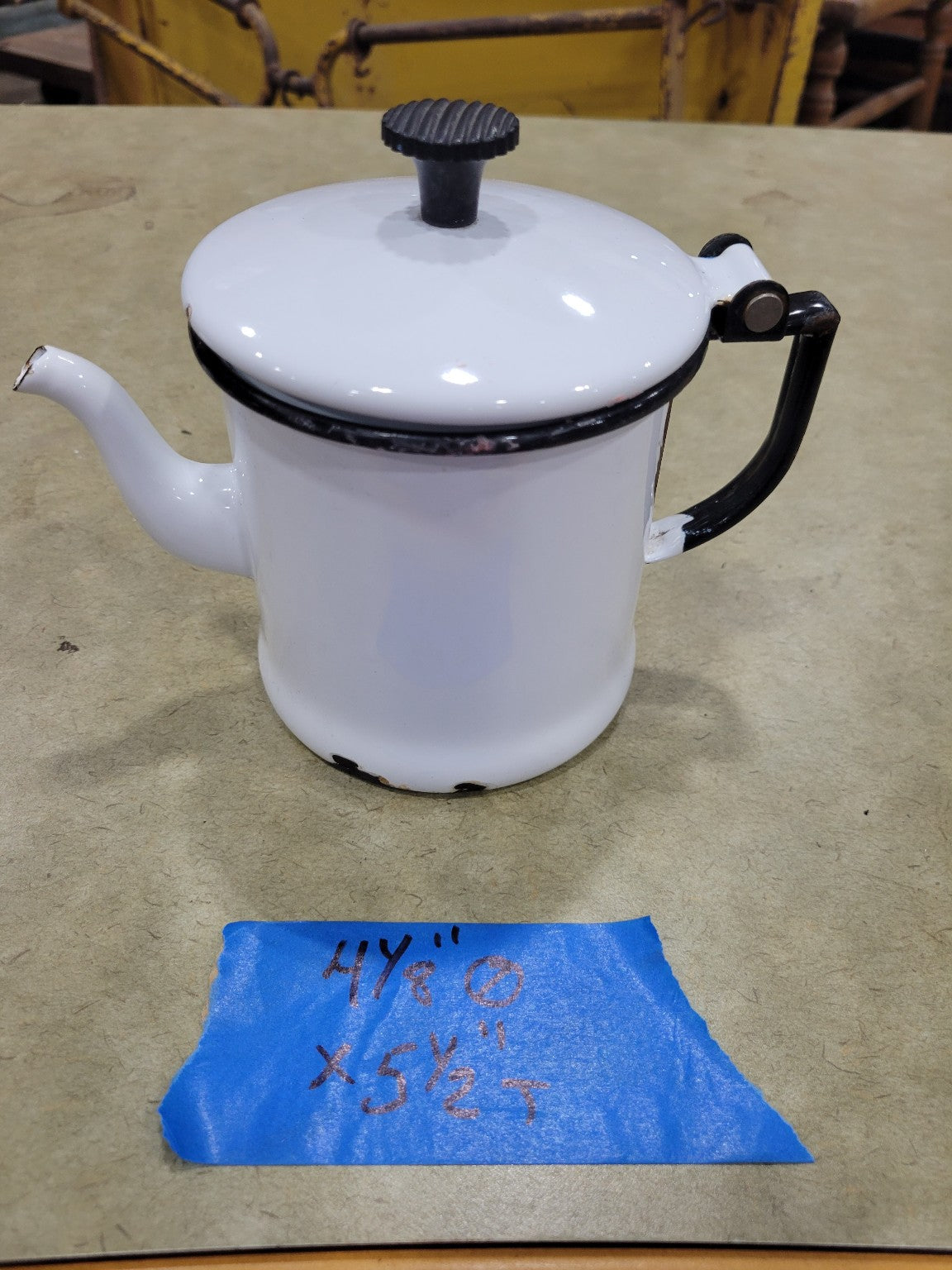 White Enamel Coffee Pot with Black Handle and Lid