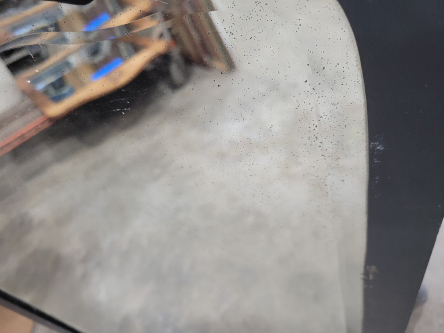 Antique Black Painted Mirror with Carved Crest