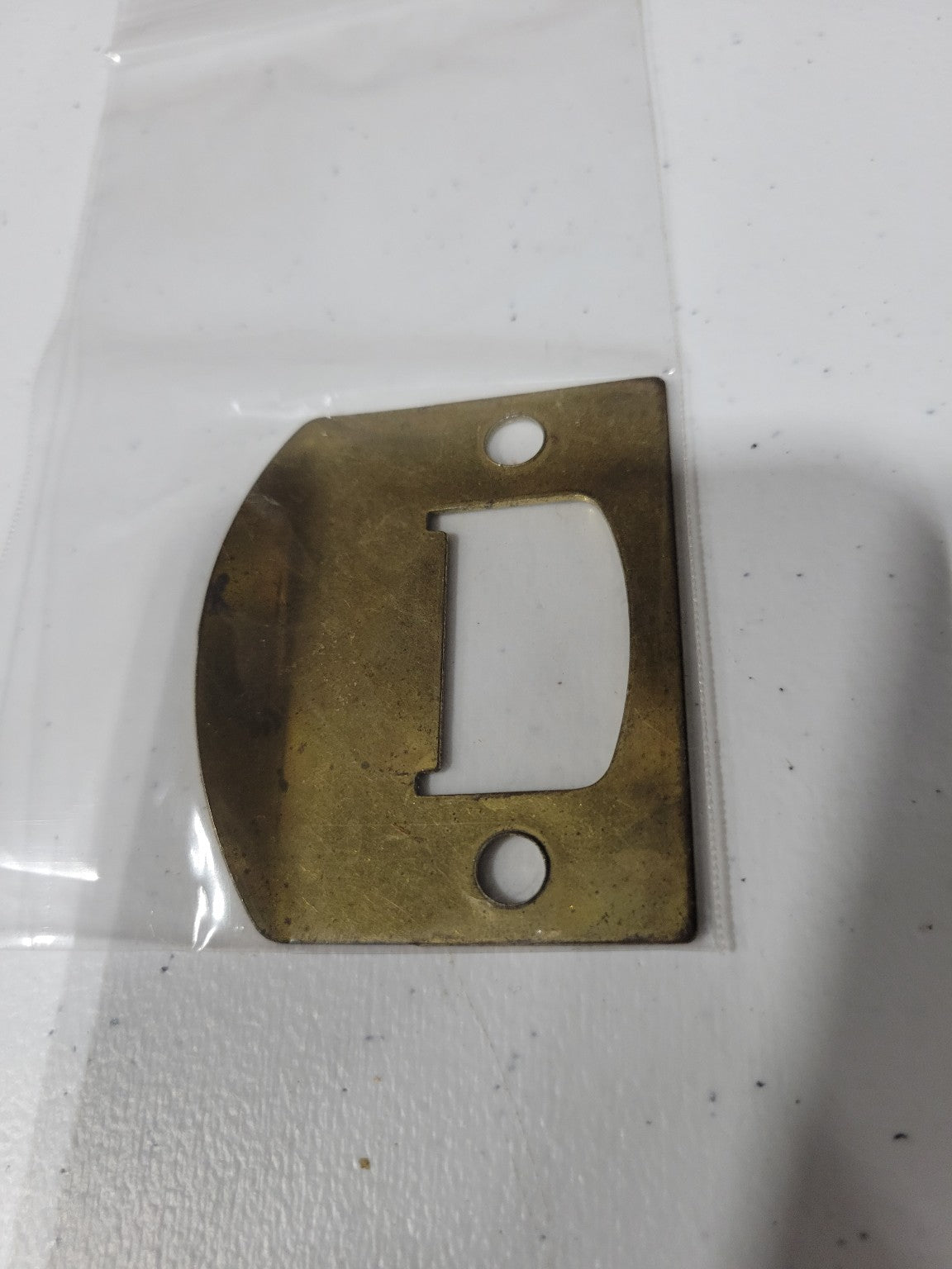 Brass Rounded Lip Strike Plate – 2¼ x 1⅞