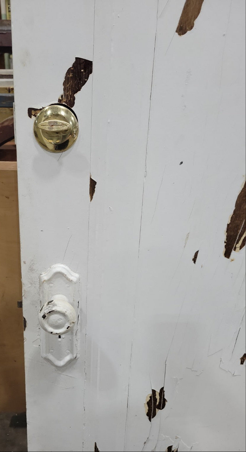 Antique Single Panel Door with Layered Paint and Brass Hardware