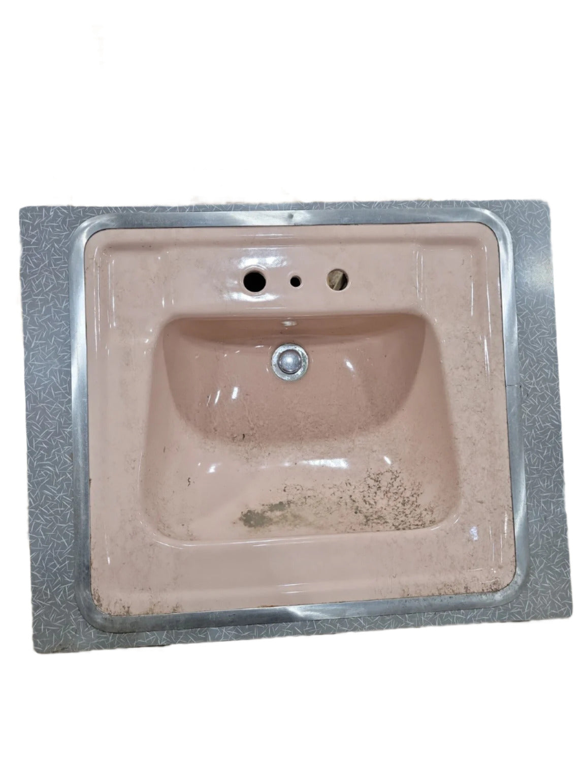 Vintage Pink Porcelain Bathroom Sink with Retro Laminate Countertop