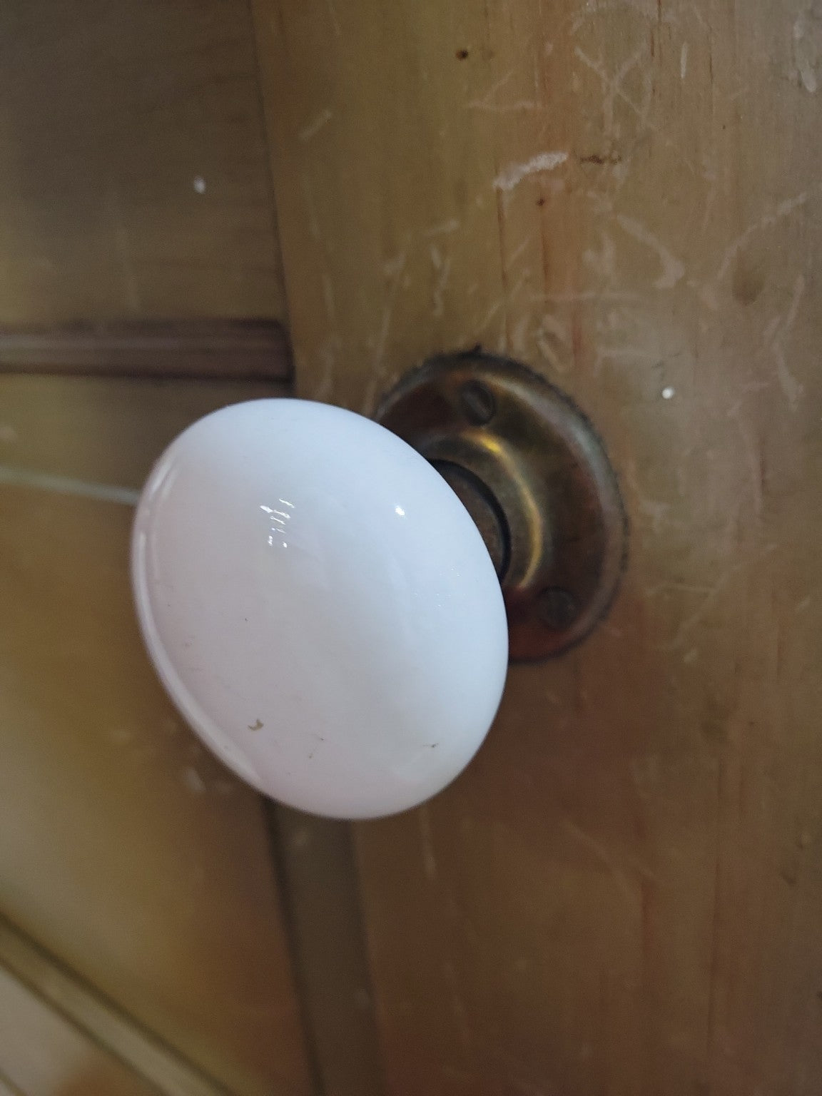 Antique 4-Panel Solid Wood Door with Porcelain Knob and Brass Hardware