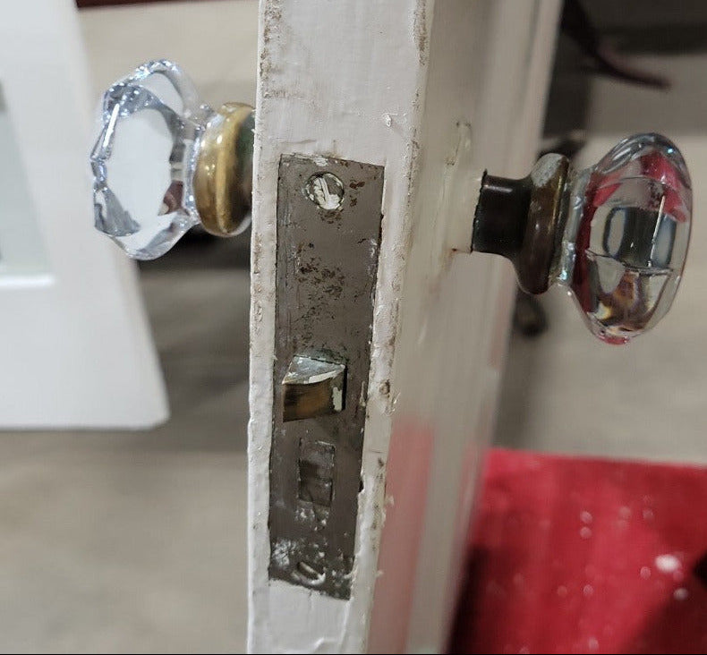 Antique Two-Panel Solid Wood Door with Glass Knob and Brass Hardware