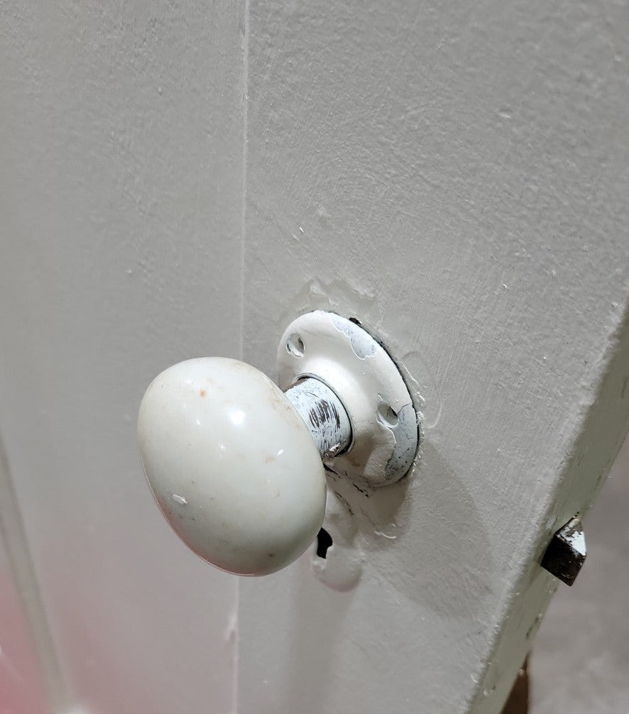 Vintage Two-Panel Interior Door with Porcelain Knobs