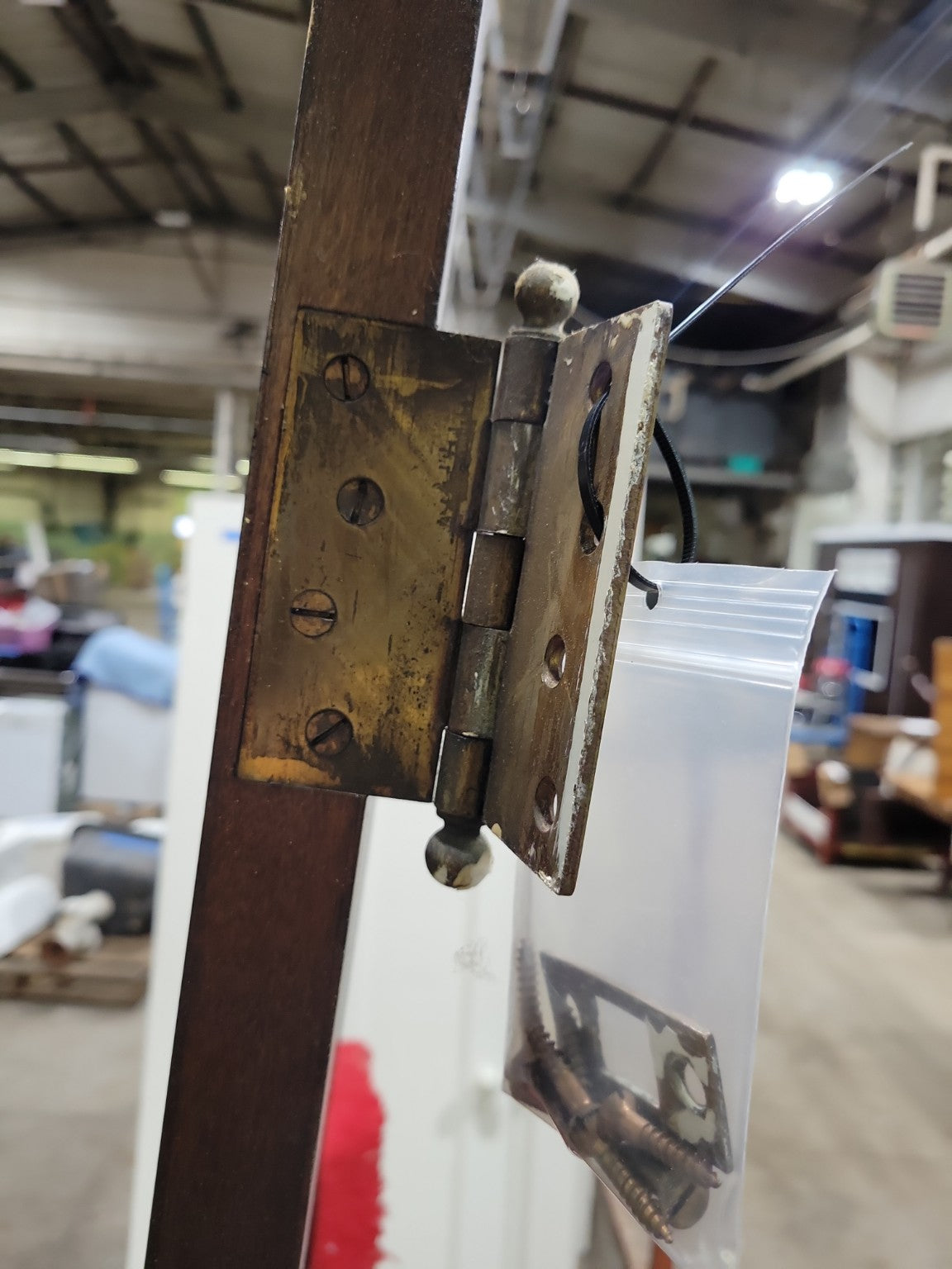 Antique Two-Panel Stained Wood Interior Door with Glass Knobs