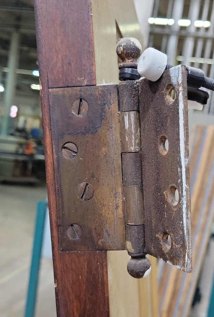 Antique Two-Panel Interior Door with Brass and Glass Knob