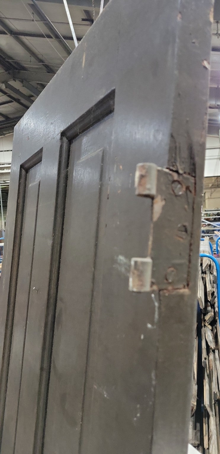 Antique Four-Panel Interior Door – Dark Stained Wood – 25 ⅞" x 79"