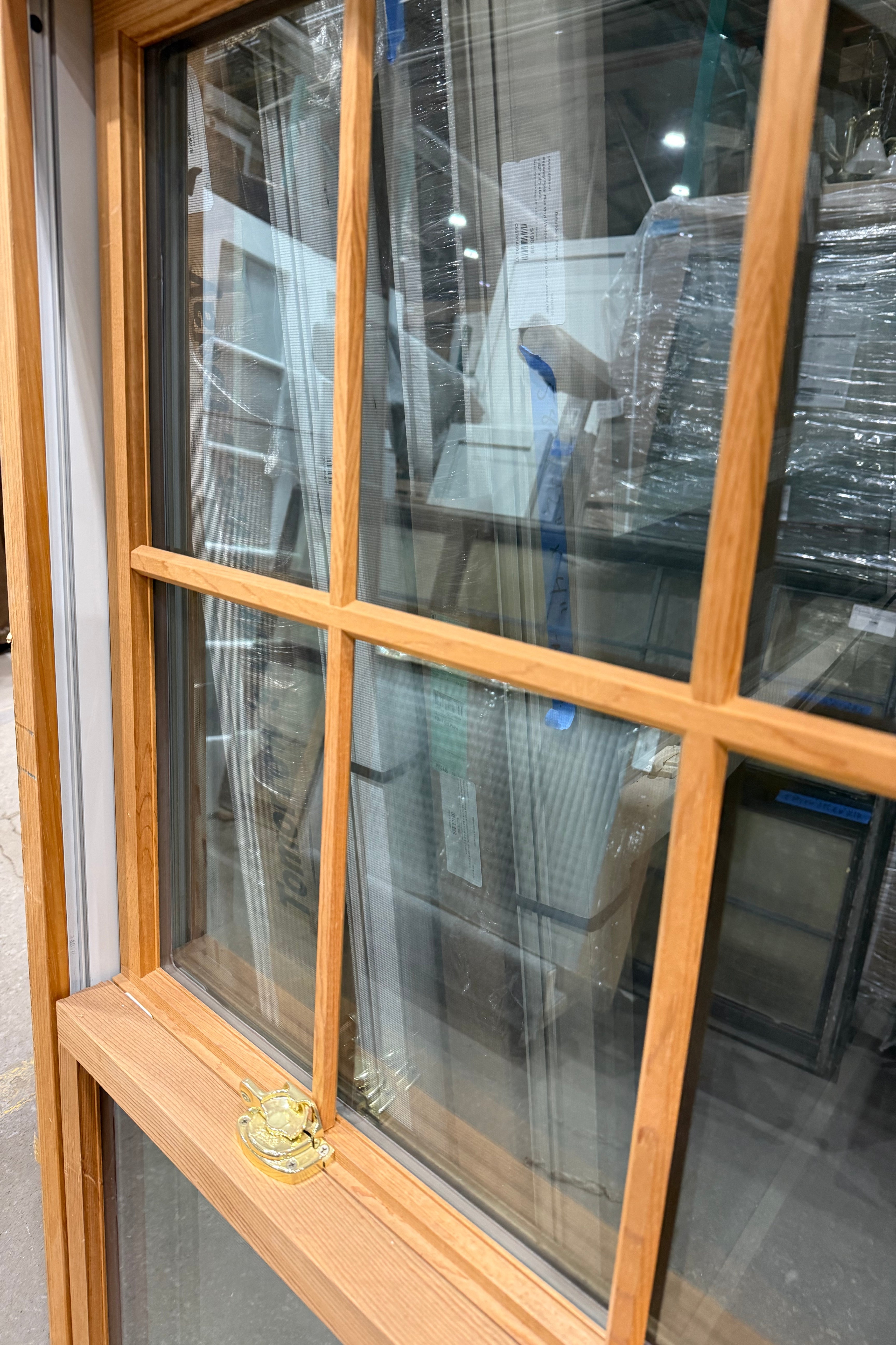 Pella Window with Divided Light Grille and Screen - 48” h x 53” w