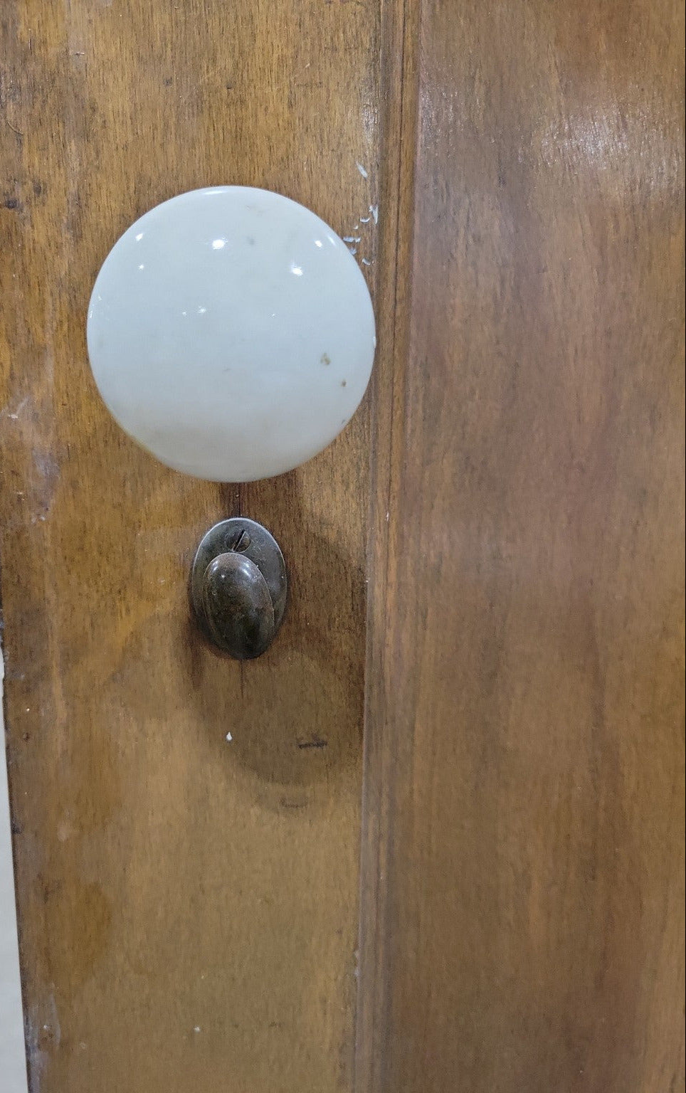 Vintage 2-Panel Wood Door with White Porcelain Knob