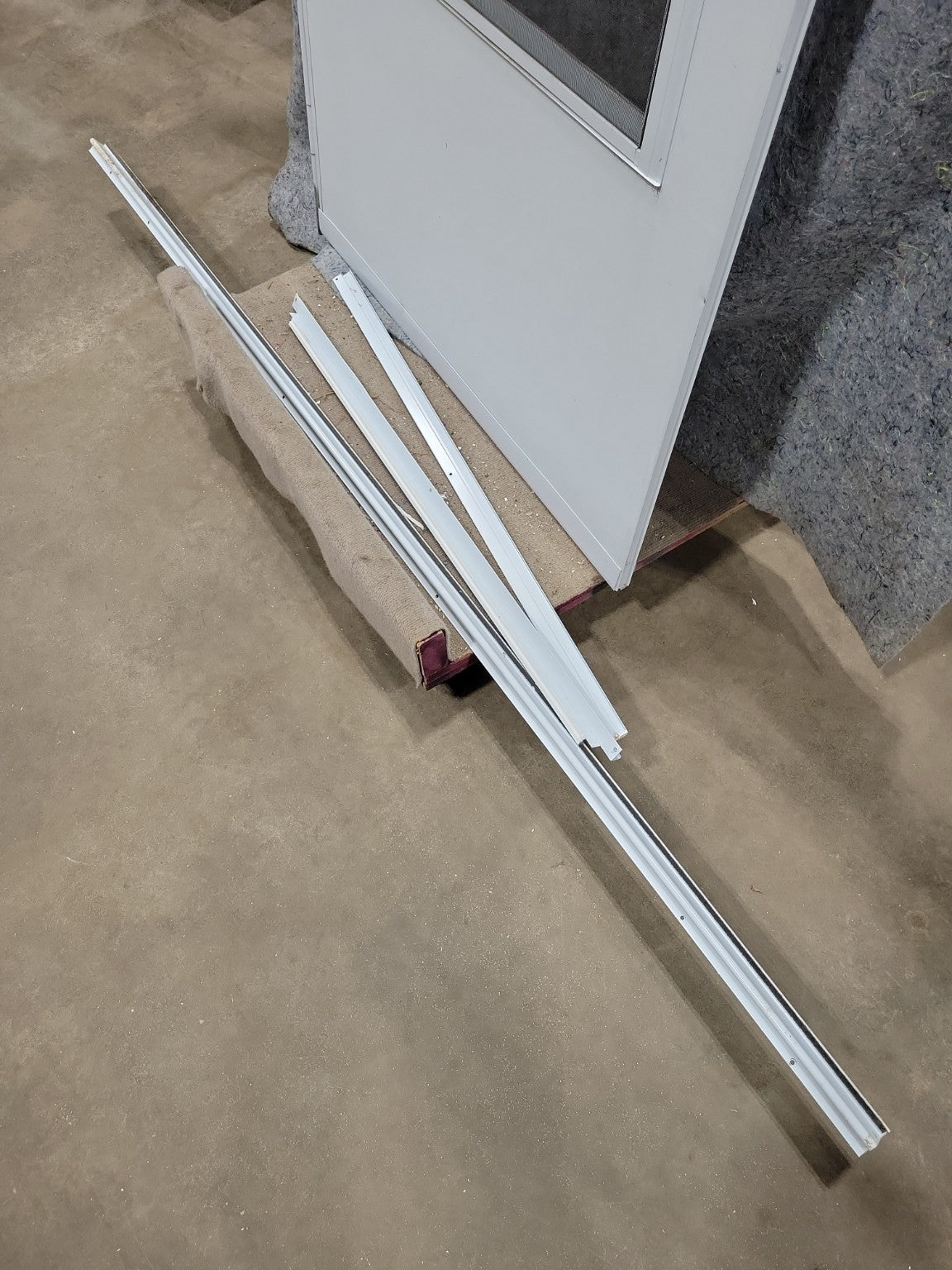 White Aluminum Storm Door with Screen and Mounting Trim – 35 ½" x 79 ¼"