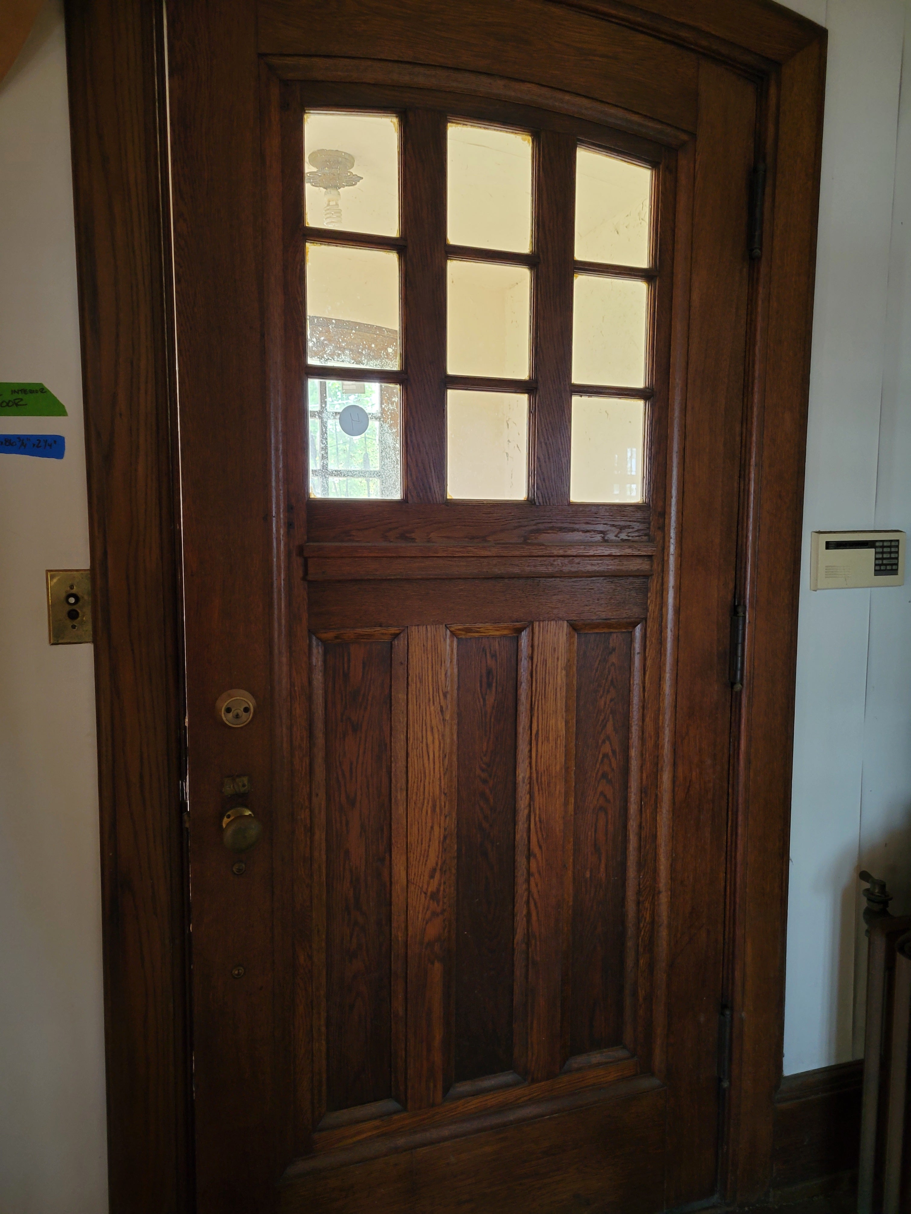 1913 Arched Top Oak Foyer Interior Door with Divided Lites