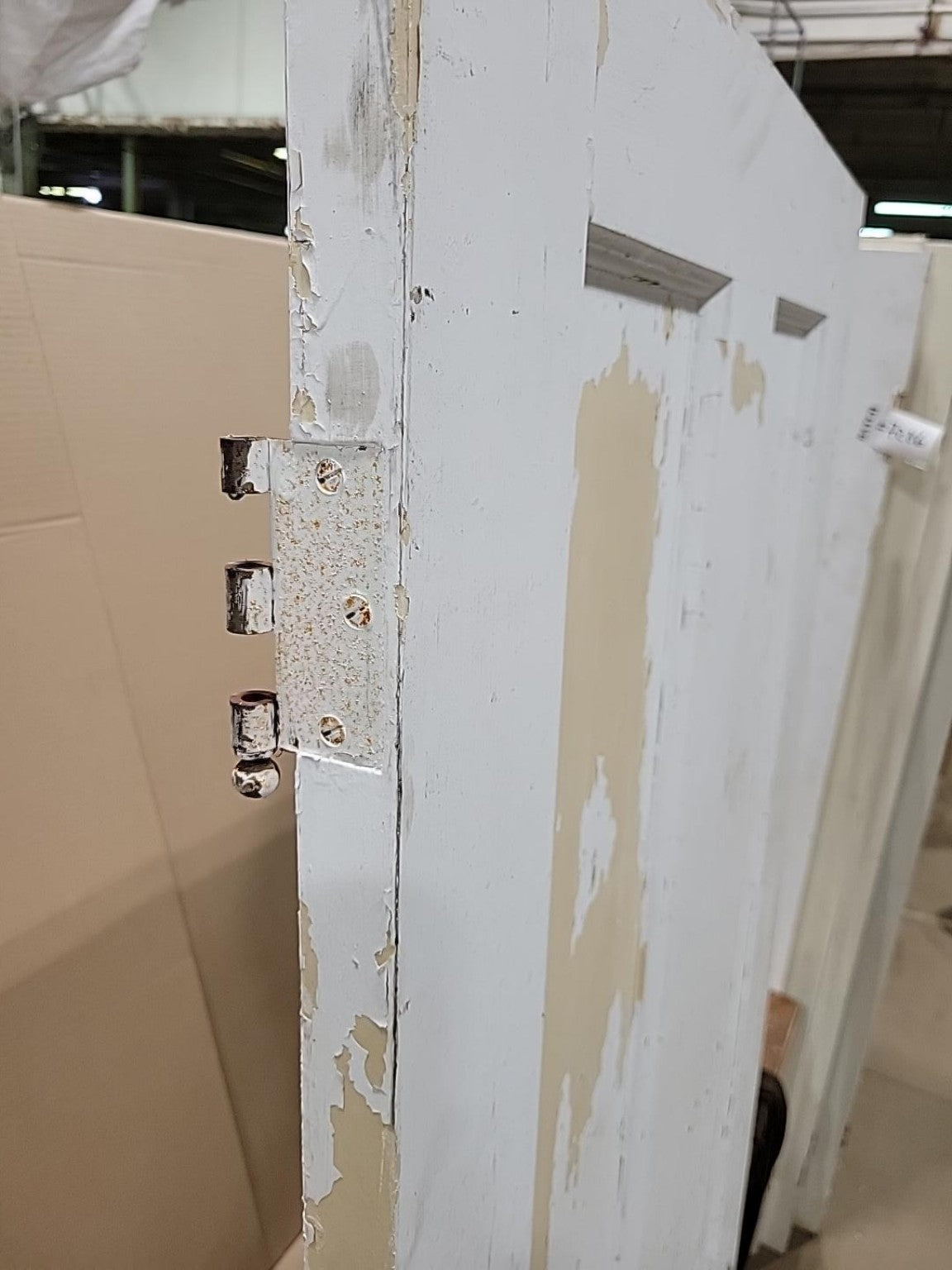 Vintage White Two-Panel Wood Door with Glass Knobs